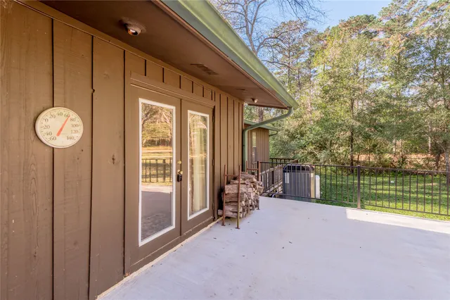 a view of a chair and table in a balcony