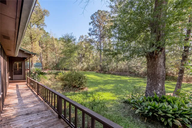 a view of a porch with a yard