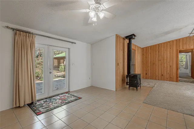 a view of room with window and furniture