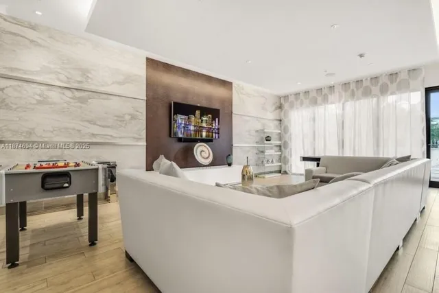 a kitchen with a sink and a refrigerator