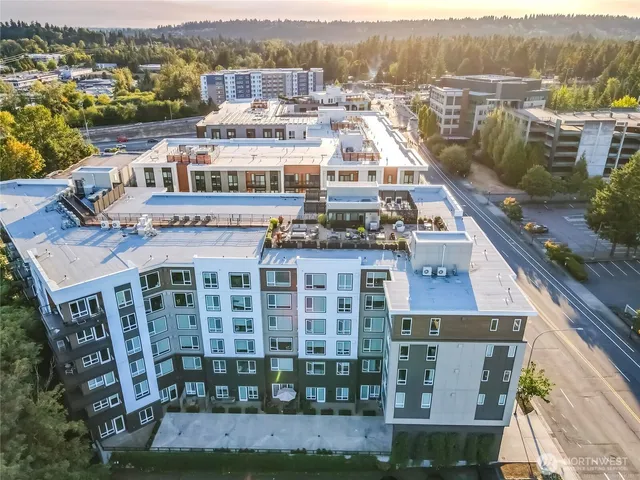 an outdoor space with furniture and ocean view