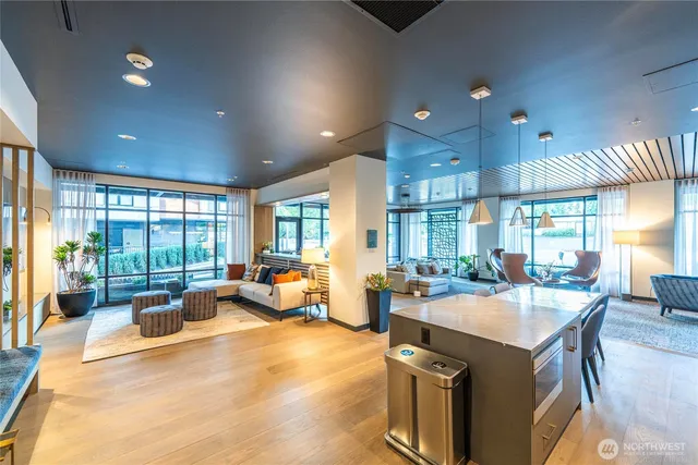 a spacious bathroom with a large tub shower and sink