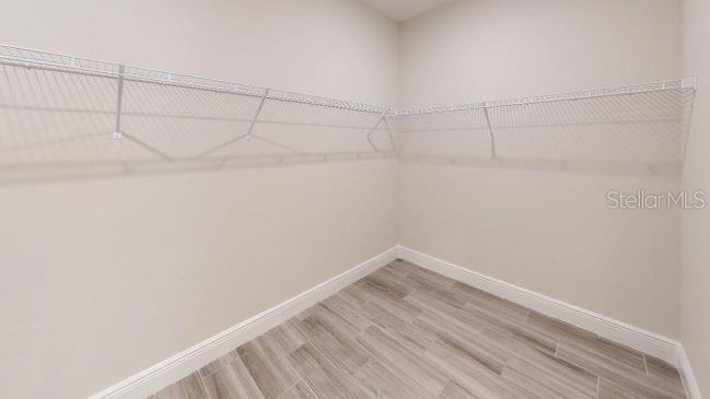 Tbd Mohawk Road Venice, FL 34293 - Photo 11 of 16 a view of a room with racks on the wall