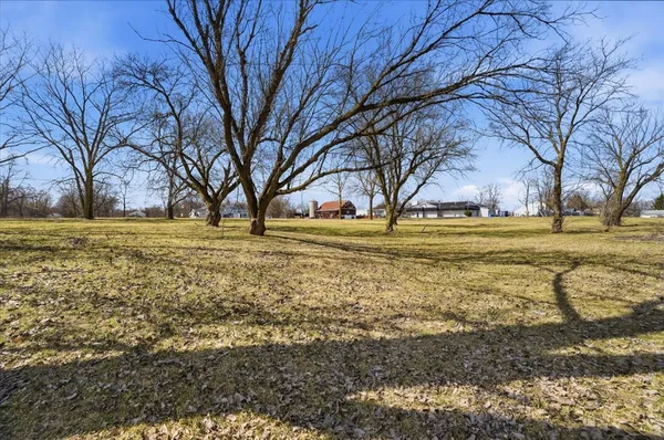 a view of ocean view with large trees