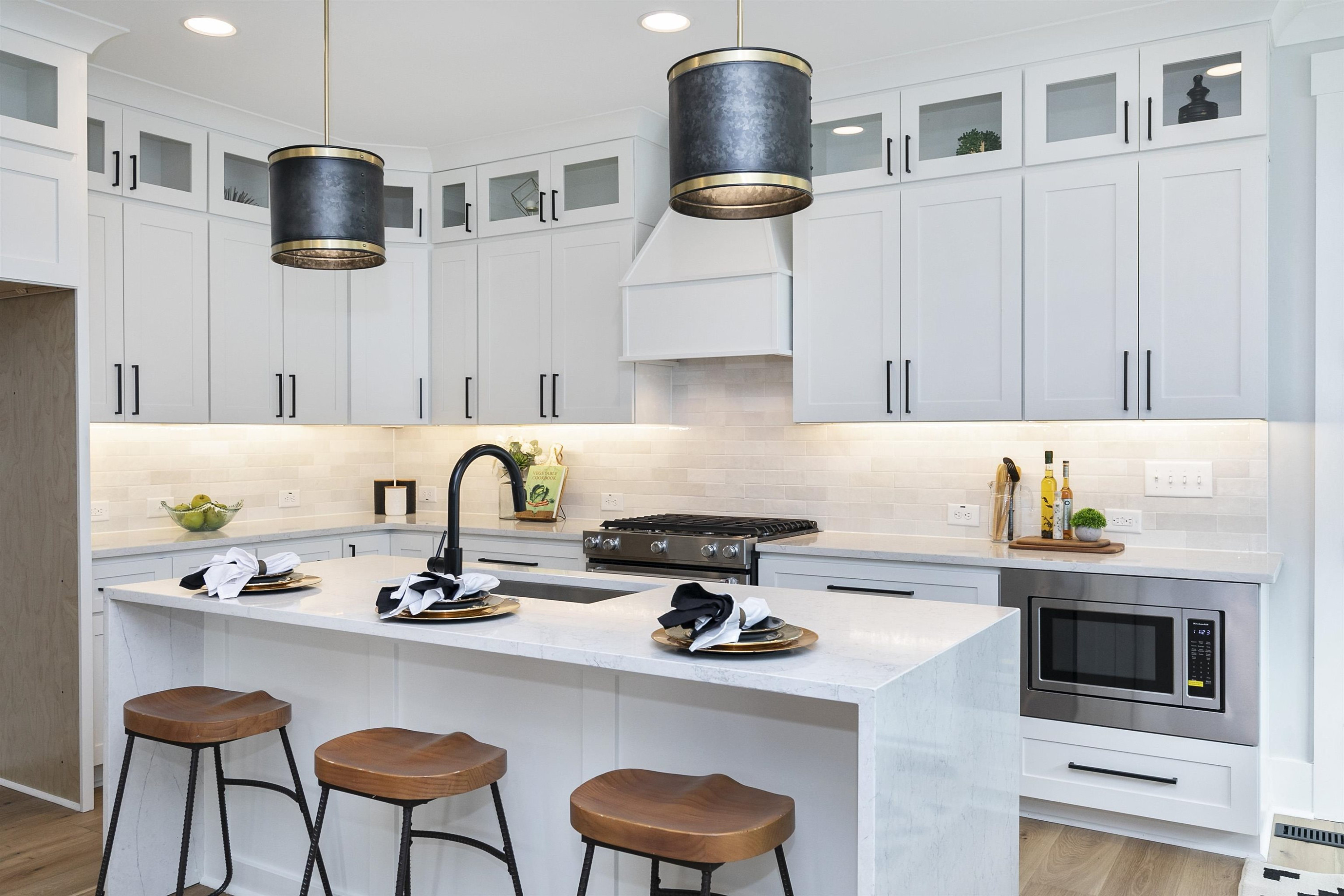 114 Summit Avenue Raleigh, NC 27603 - Photo 11 of 62 a kitchen with a dining table and chairs