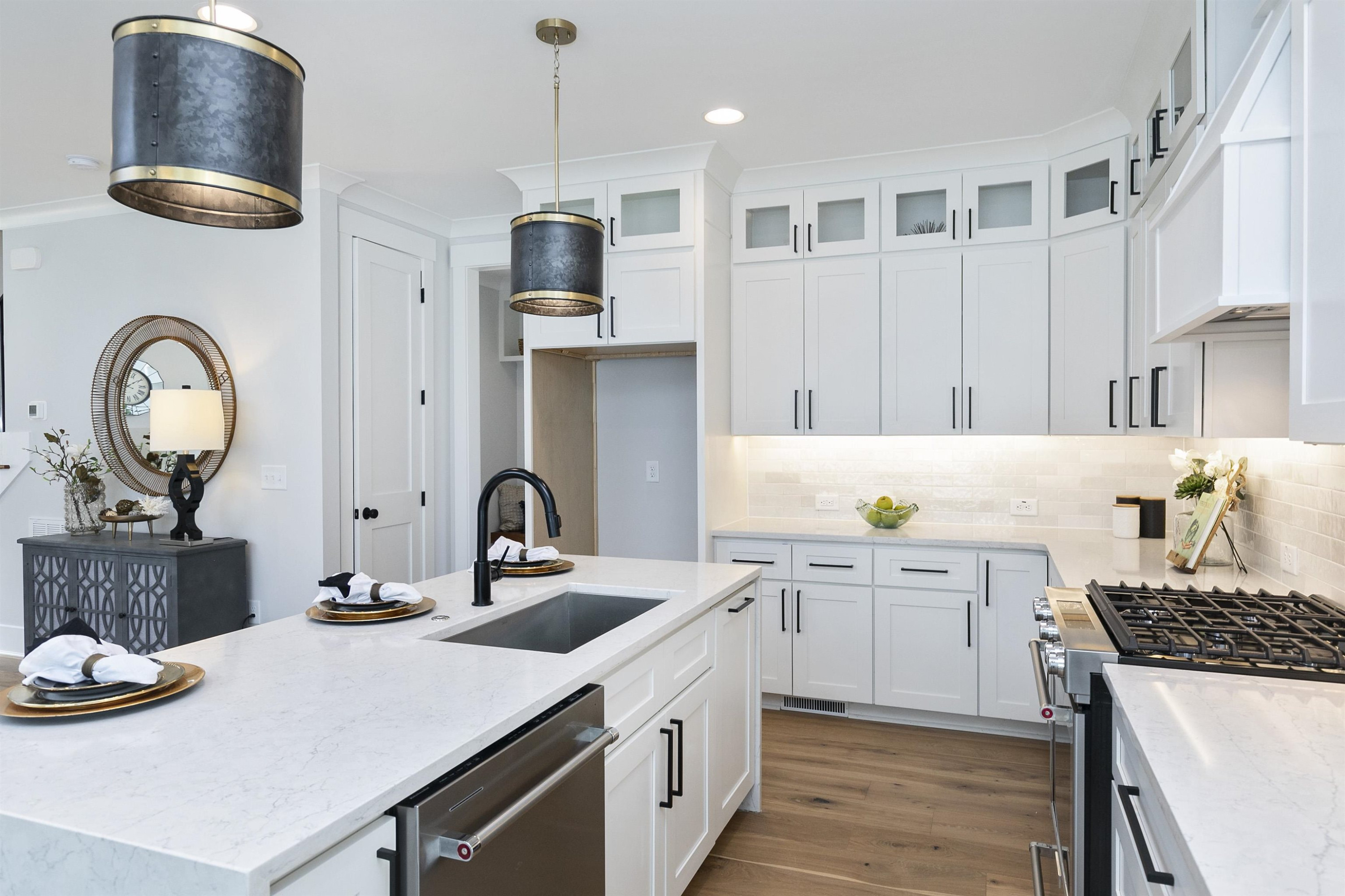 114 Summit Avenue Raleigh, NC 27603 - Photo 12 of 62 a kitchen with stainless steel appliances granite countertop a sink a stove and cabinets