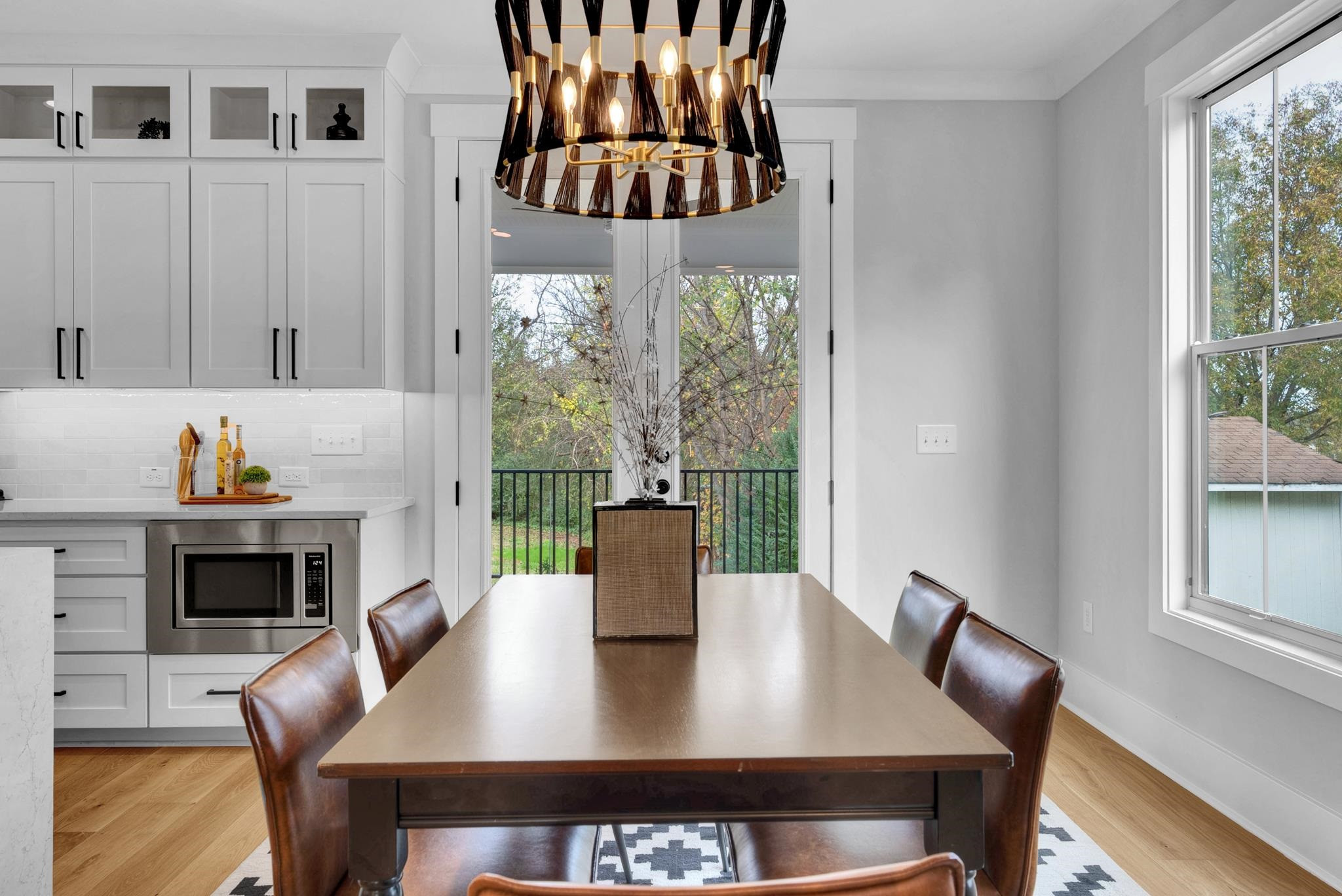 114 Summit Avenue Raleigh, NC 27603 - Photo 15 of 62 a view of a dining room with furniture window and wooden floor