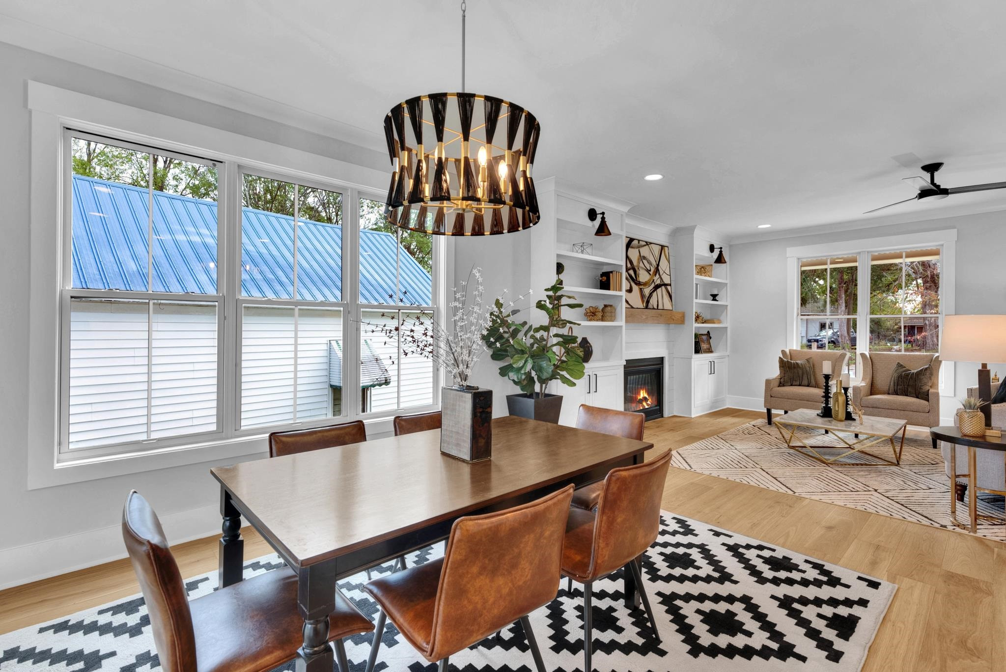 114 Summit Avenue Raleigh, NC 27603 - Photo 16 of 62 a room with furniture a chandelier and a window