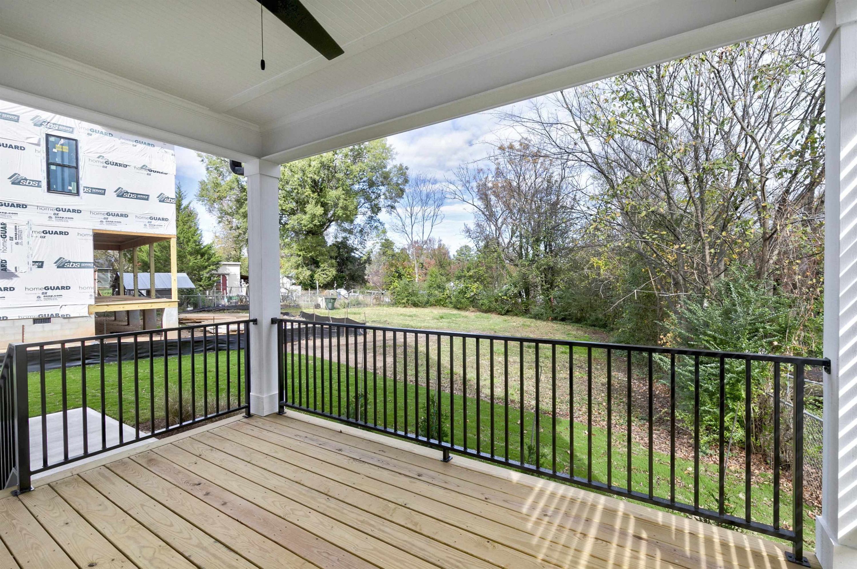 114 Summit Avenue Raleigh, NC 27603 - Photo 21 of 62 a view of balcony with wooden floor