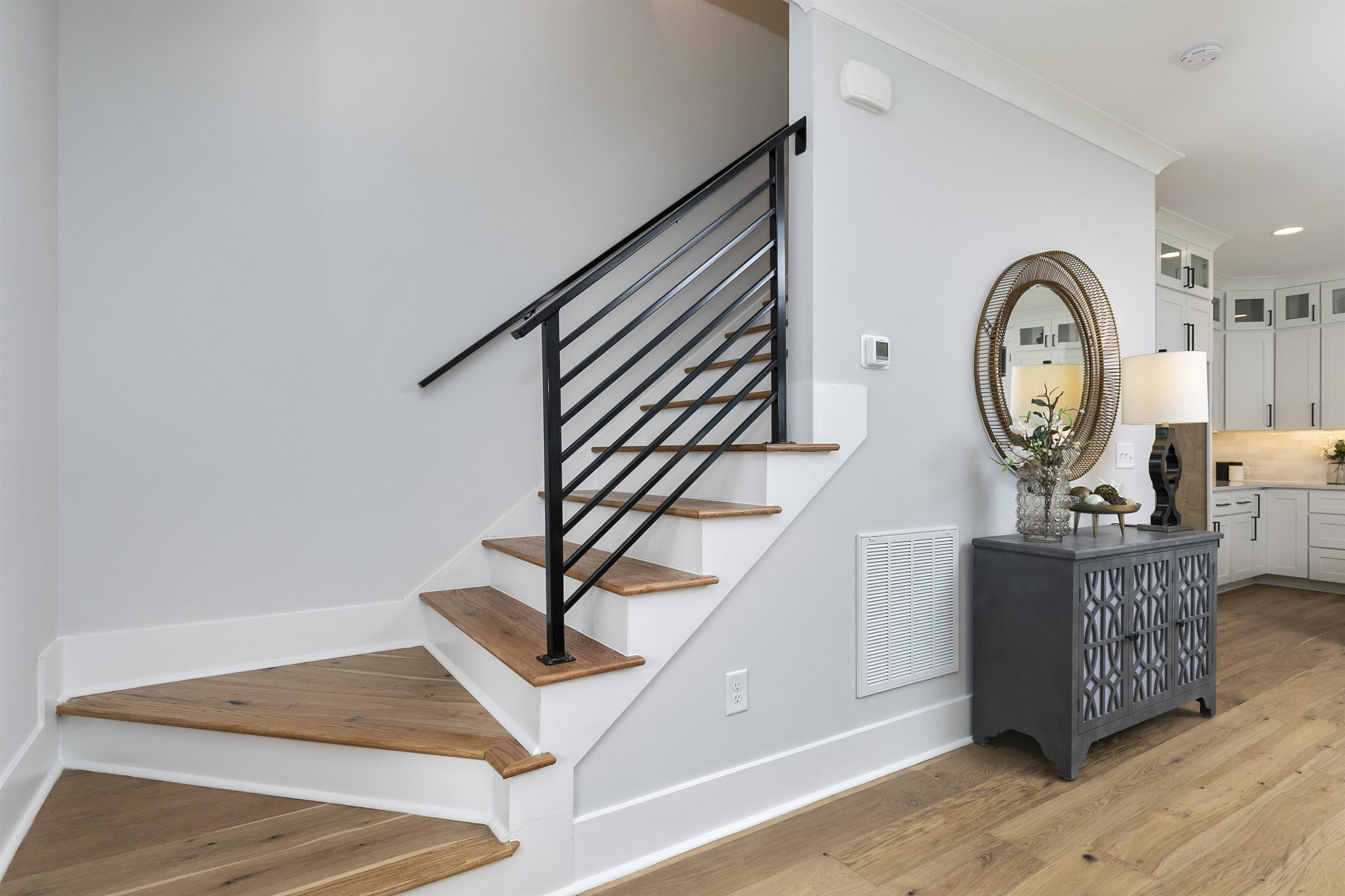 114 Summit Avenue Raleigh, NC 27603 - Photo 25 of 62 a view of entryway with wooden floor
