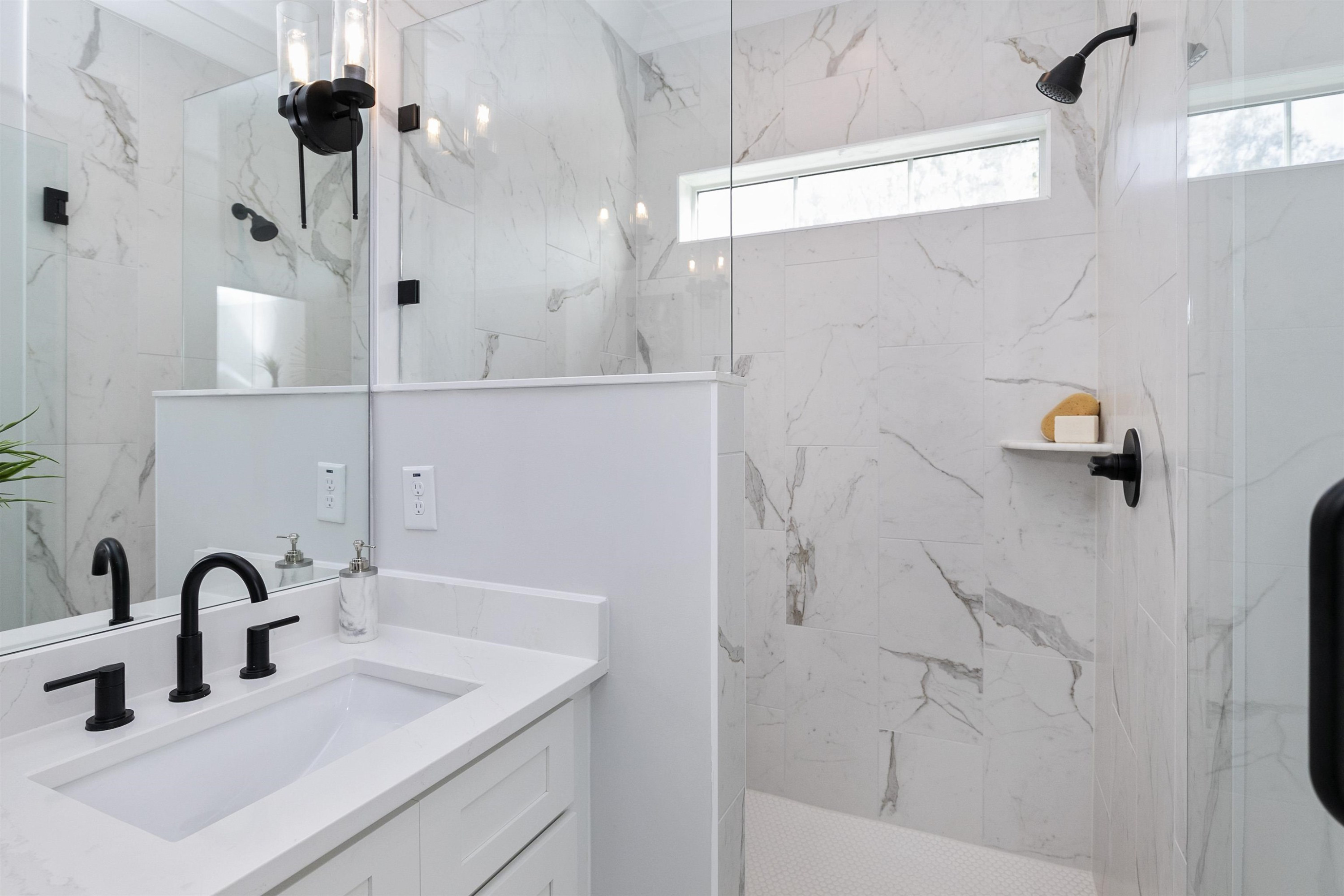 114 Summit Avenue Raleigh, NC 27603 - Photo 30 of 62 a bathroom with a sink and mirror