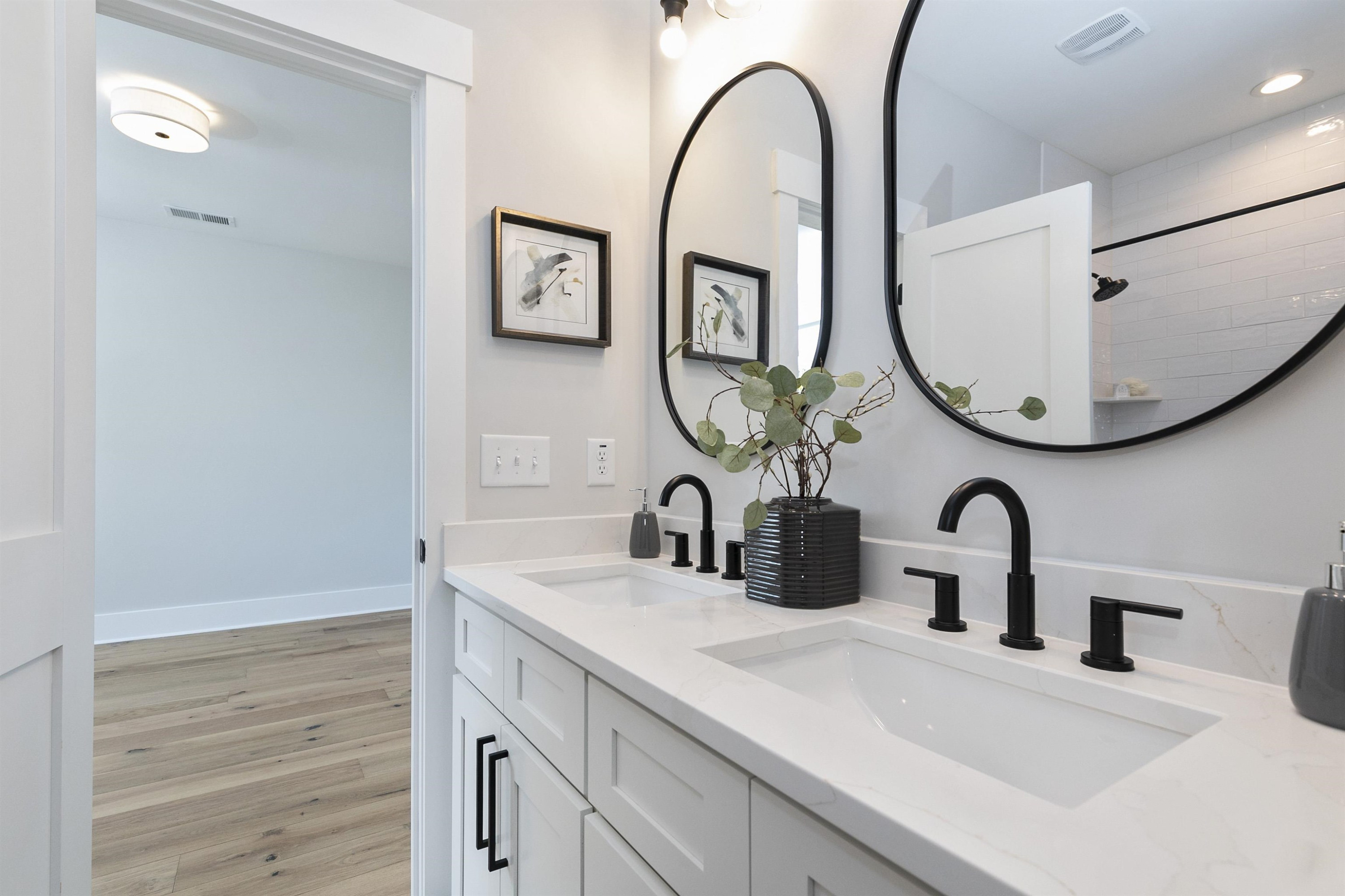 114 Summit Avenue Raleigh, NC 27603 - Photo 34 of 62 a bathroom with a sink and a mirror
