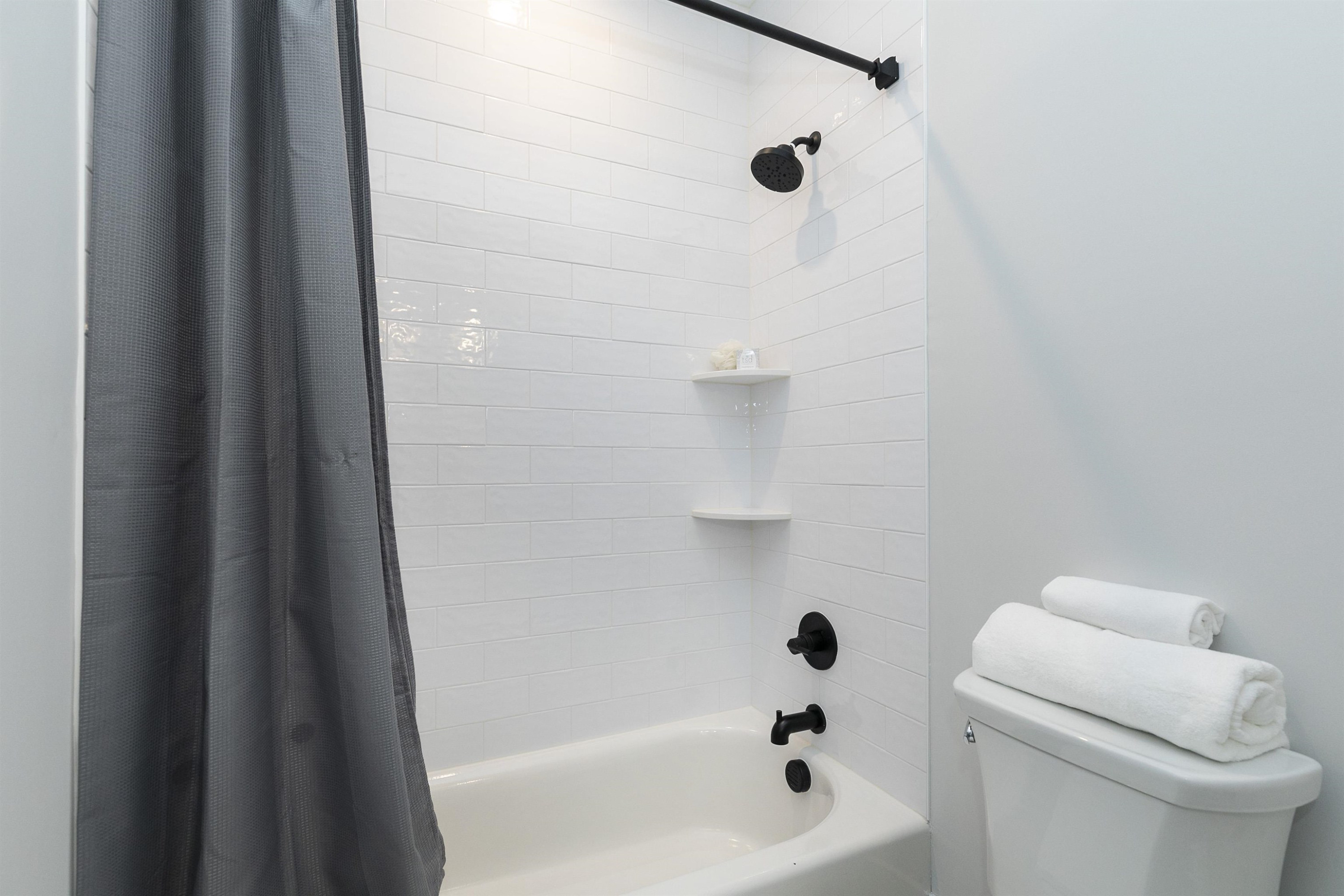 114 Summit Avenue Raleigh, NC 27603 - Photo 36 of 62 a bathroom with a bathtub