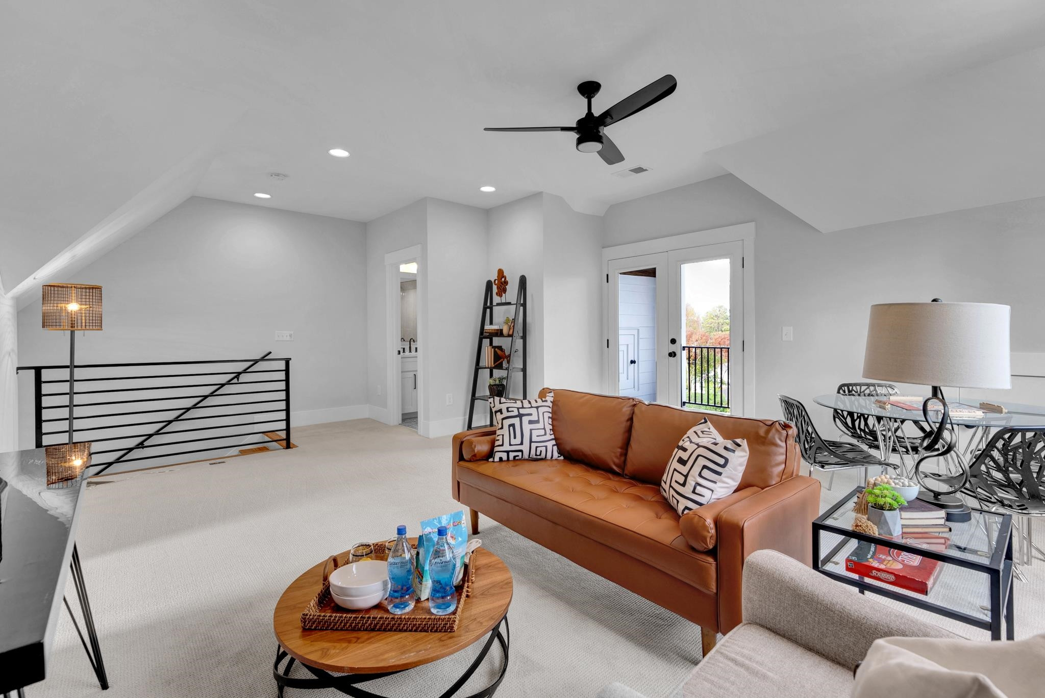 114 Summit Avenue Raleigh, NC 27603 - Photo 39 of 62 a living room with furniture and a lamp