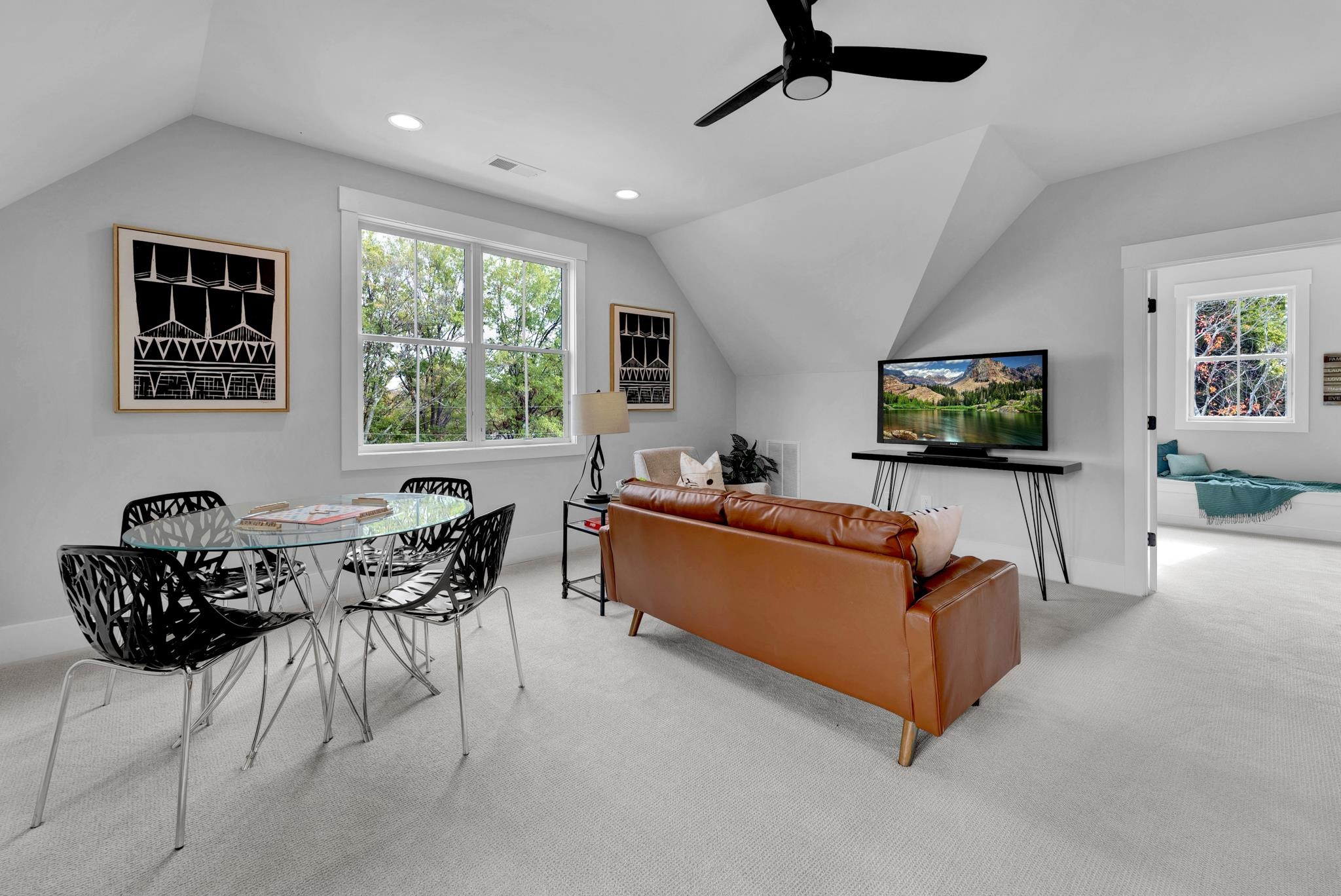 114 Summit Avenue Raleigh, NC 27603 - Photo 44 of 62 a living room with furniture and a flat screen tv