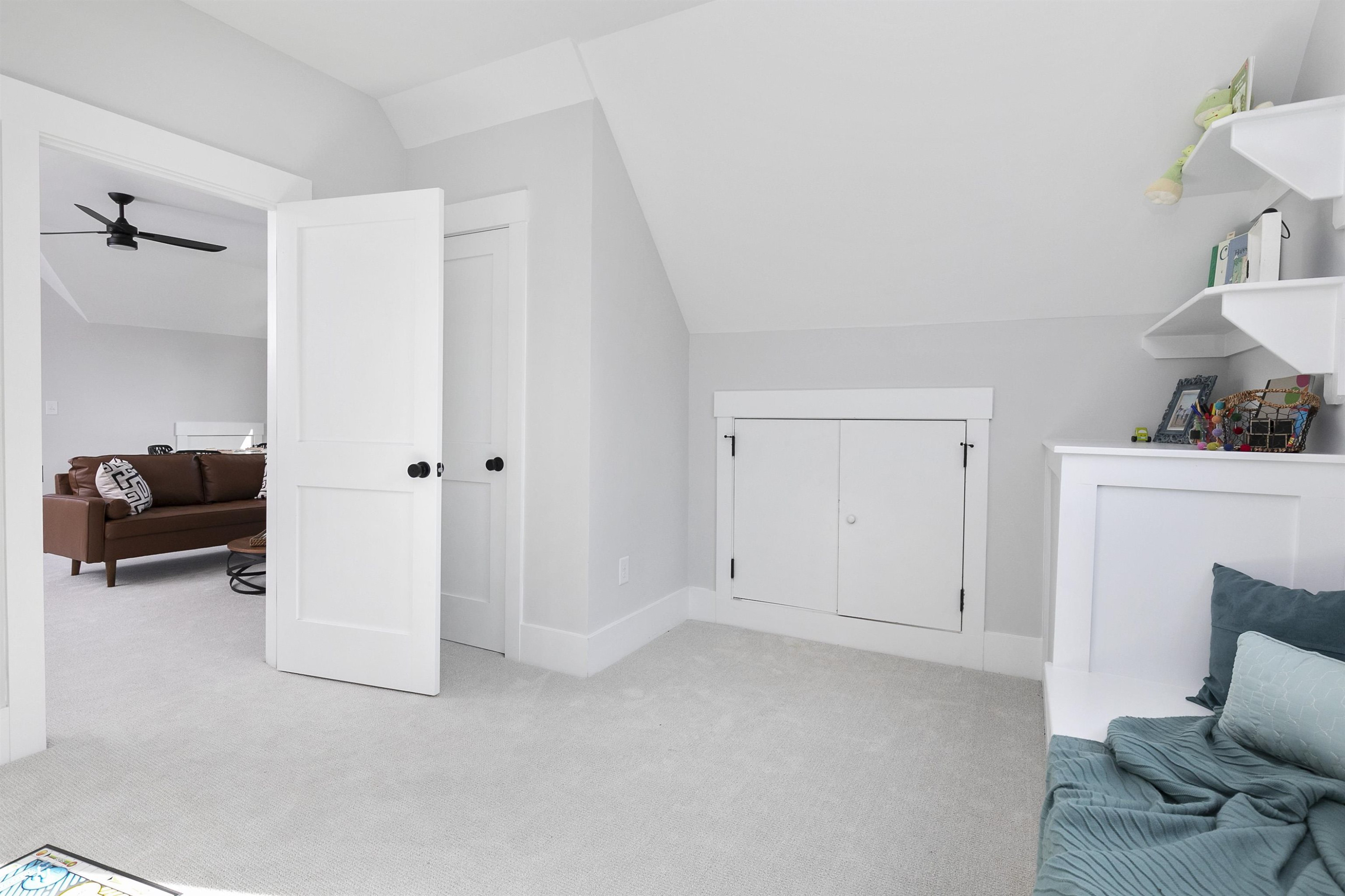 114 Summit Avenue Raleigh, NC 27603 - Photo 46 of 62 a view of livingroom with furniture and storage