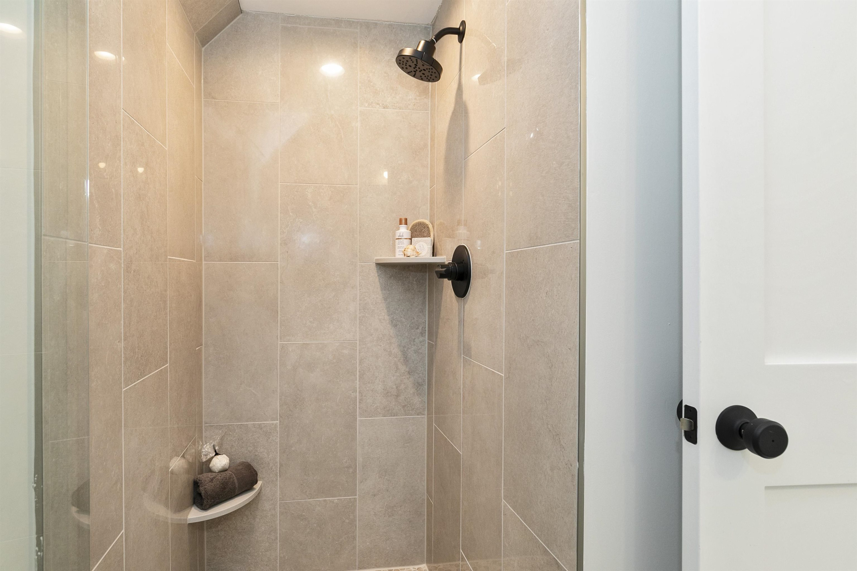 114 Summit Avenue Raleigh, NC 27603 - Photo 48 of 62 a bathroom with a shower