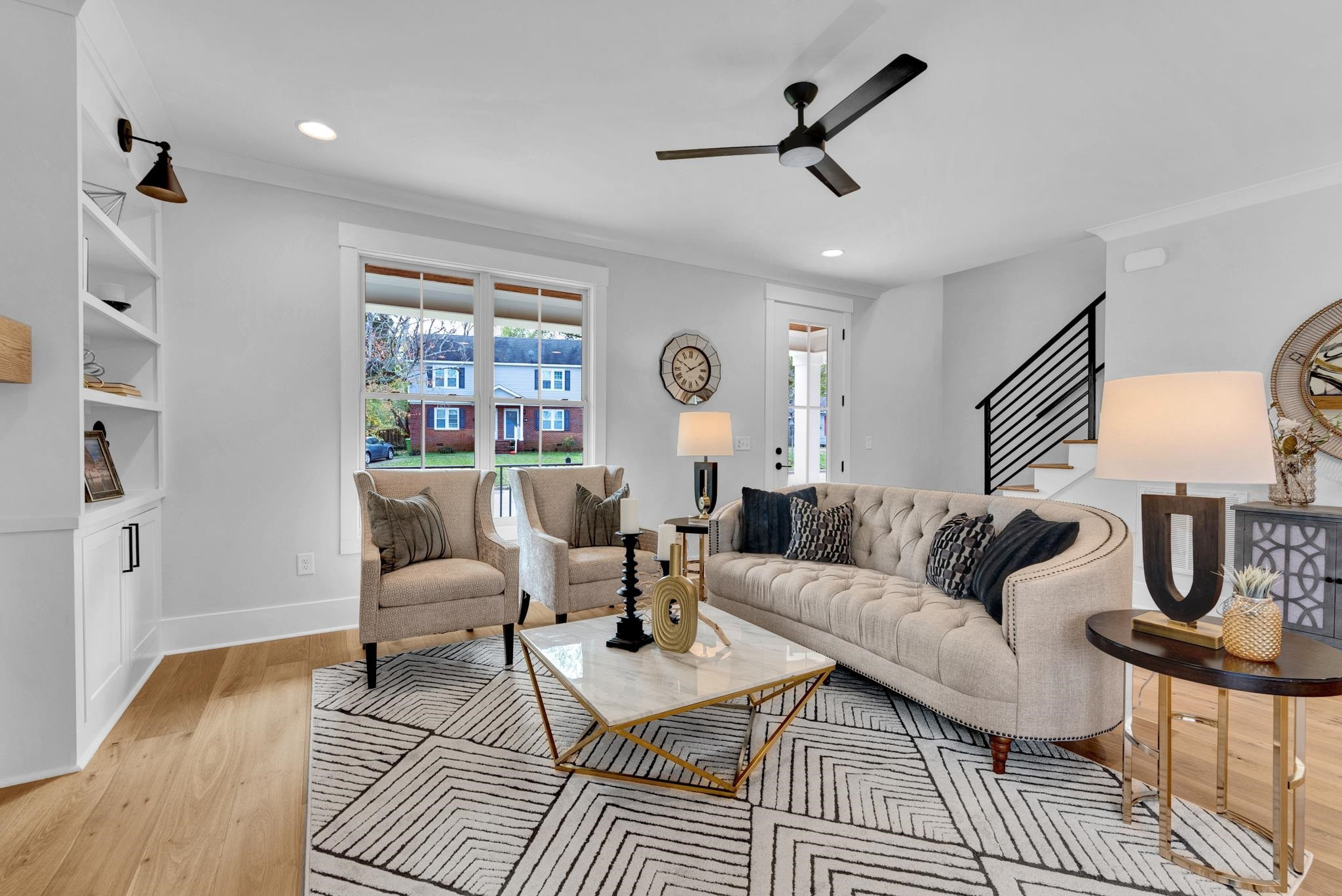 114 Summit Avenue Raleigh, NC 27603 - Photo 5 of 62 a living room with furniture a window and a table