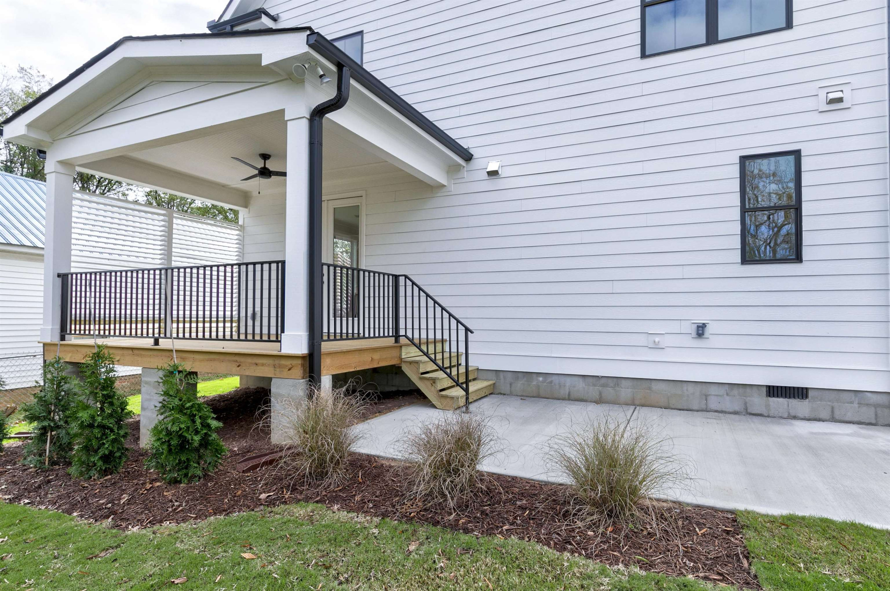 114 Summit Avenue Raleigh, NC 27603 - Photo 51 of 62 a view of a house with a yard and sitting area