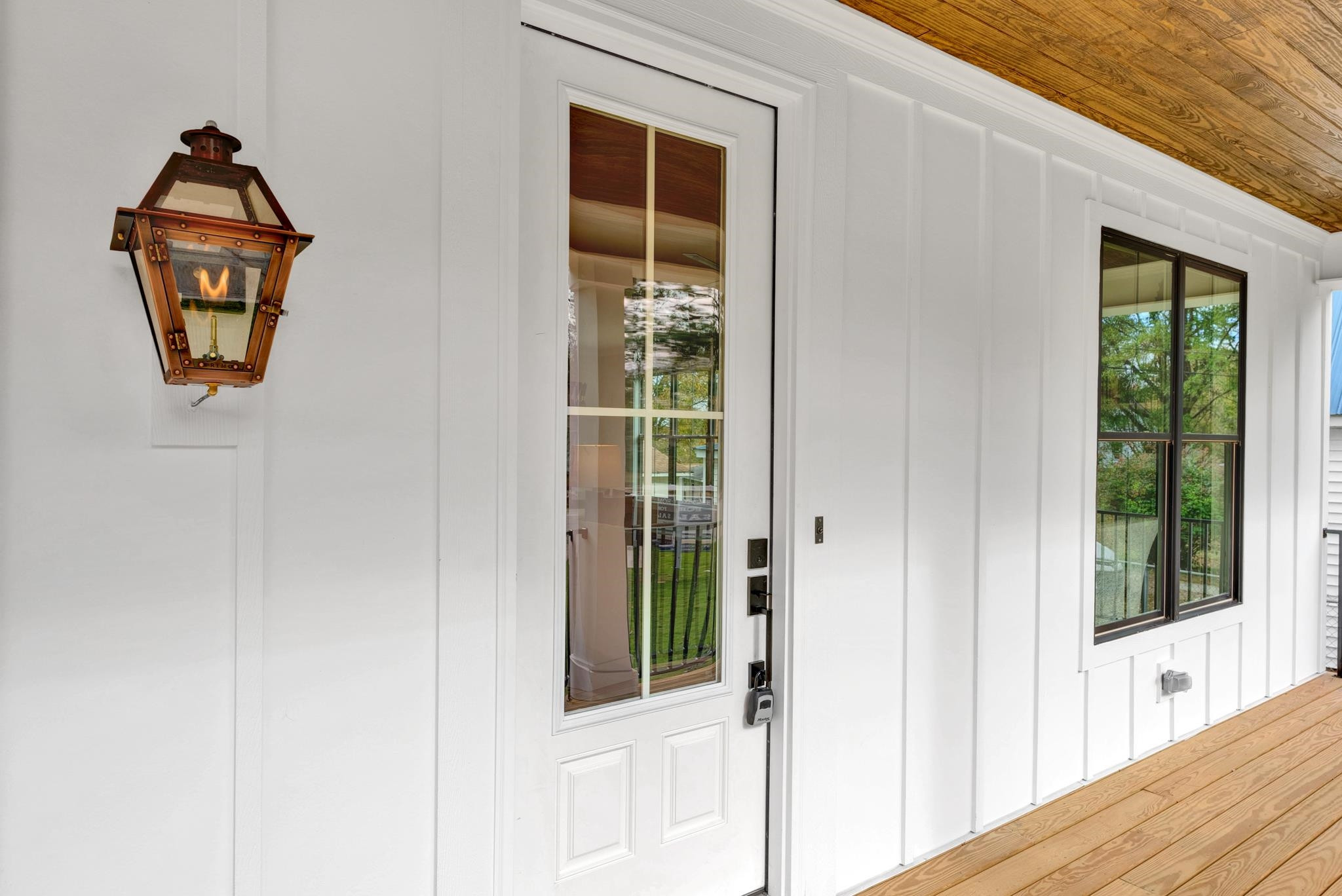 114 Summit Avenue Raleigh, NC 27603 - Photo 56 of 62 a view of a hallway with wooden floor and a window