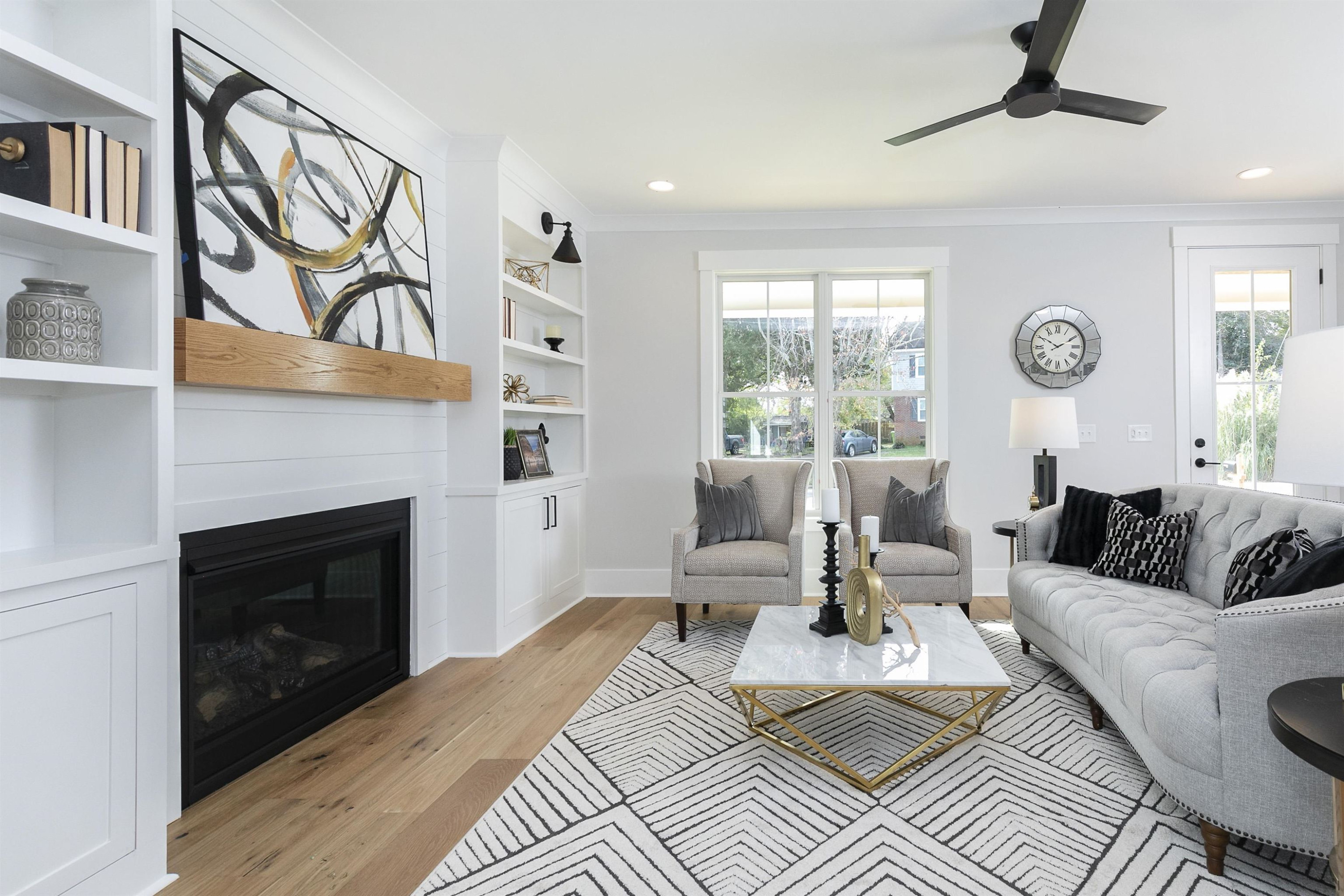 114 Summit Avenue Raleigh, NC 27603 - Photo 6 of 62 a living room with furniture a fireplace and a window