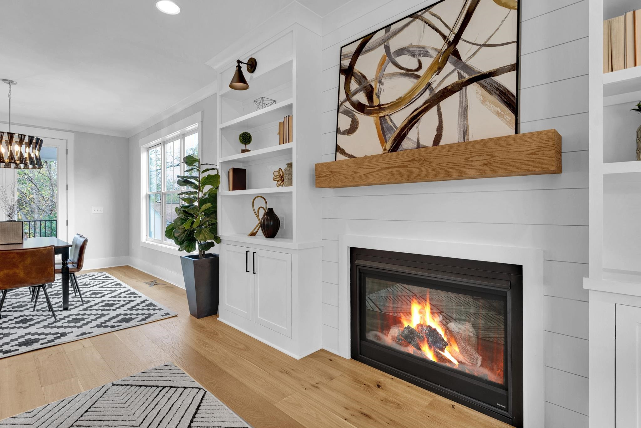 114 Summit Avenue Raleigh, NC 27603 - Photo 7 of 62 a living room with furniture and a fireplace