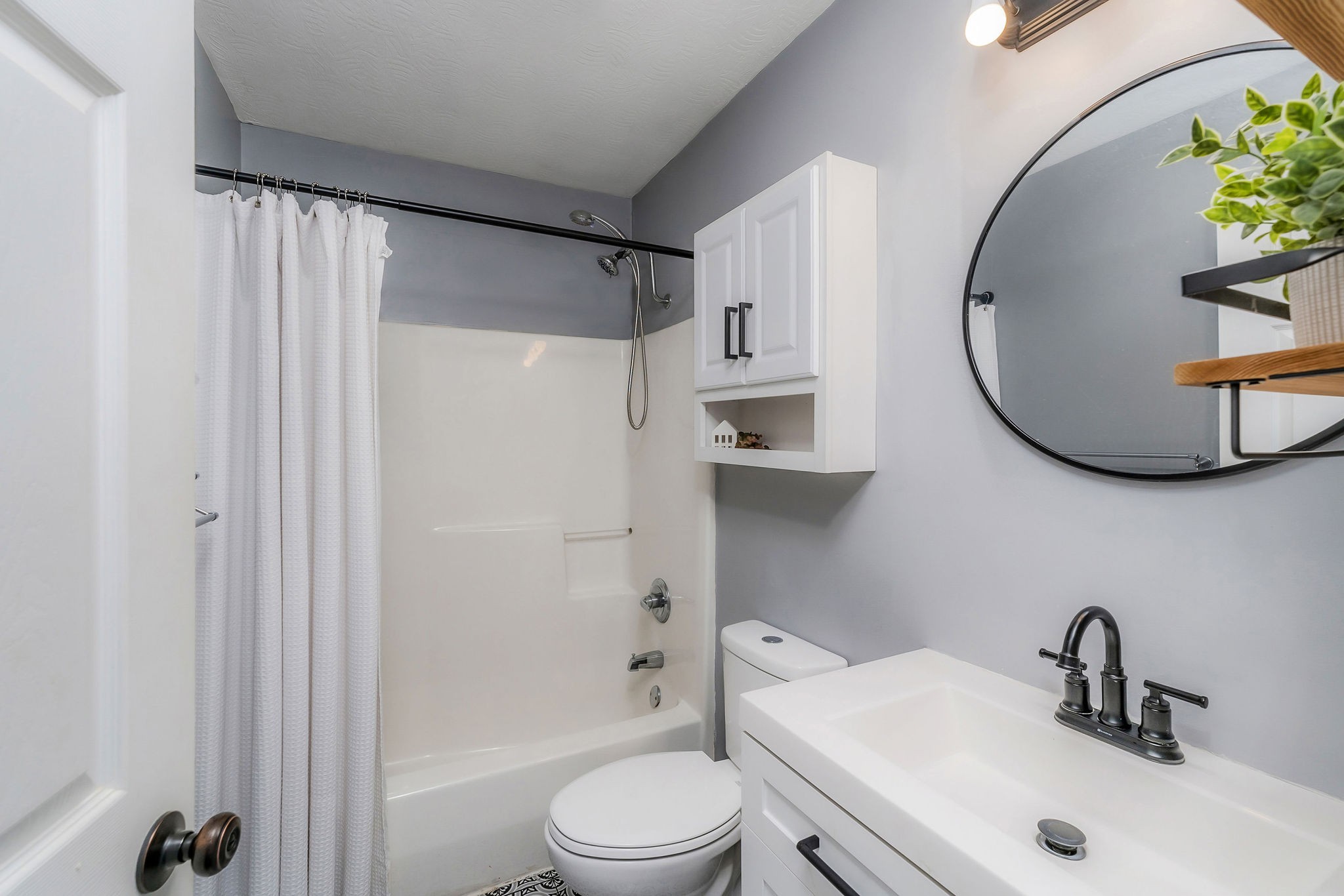 1630 Blackburn Fork Road Cookeville, TN 38501 - Photo 13 of 30 a bathroom with a sink toilet and shower