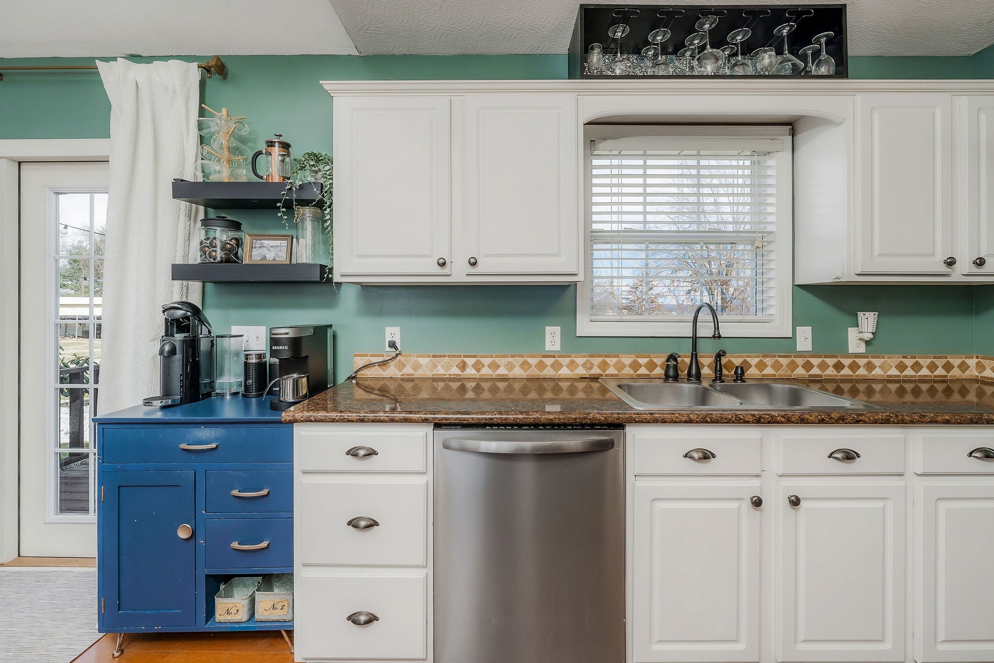 1630 Blackburn Fork Road Cookeville, TN 38501 - Photo 18 of 30 a kitchen with granite countertop a sink and a stove