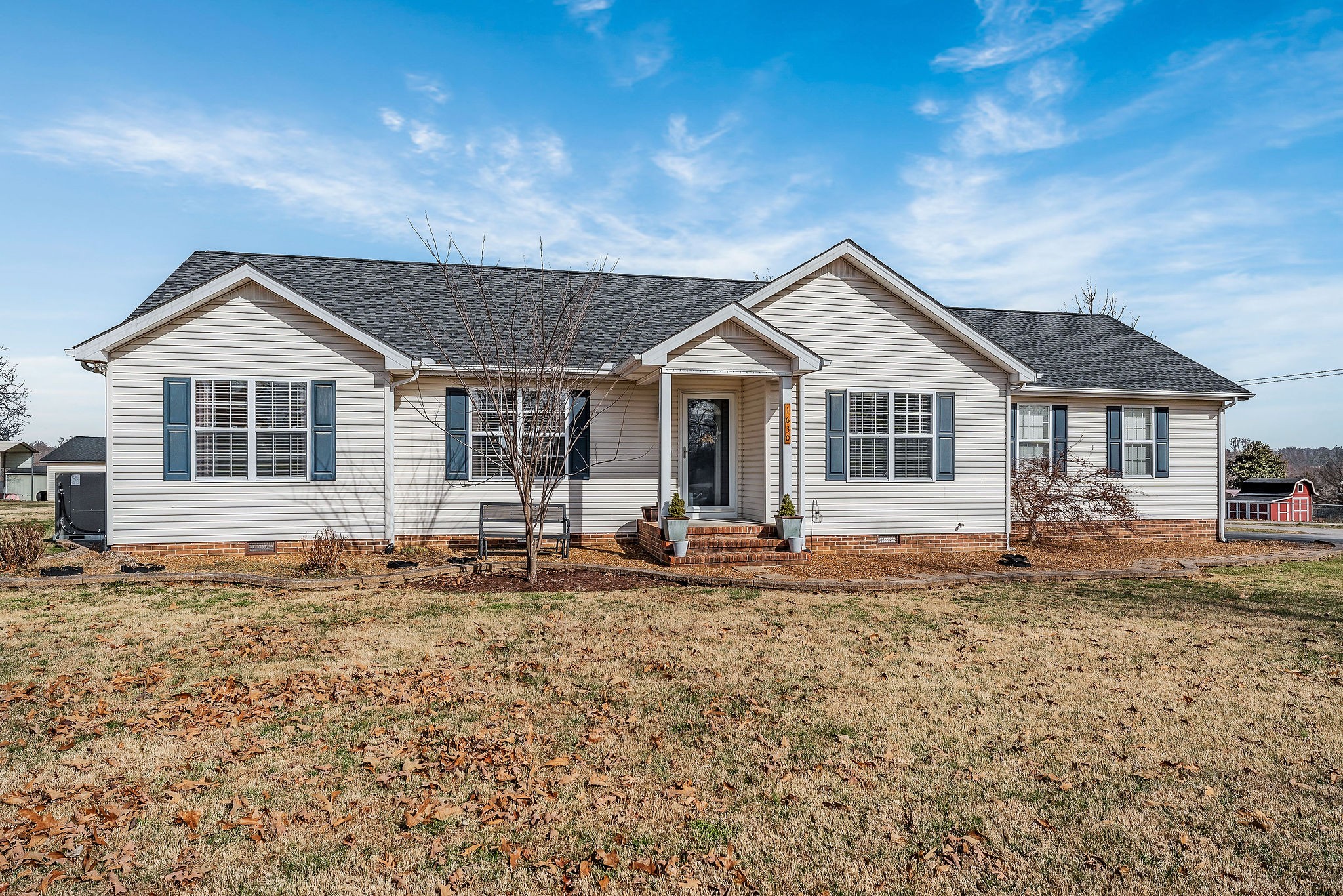 1630 Blackburn Fork Road Cookeville, TN 38501 - Photo 29 of 30 a front view of a house with a yard