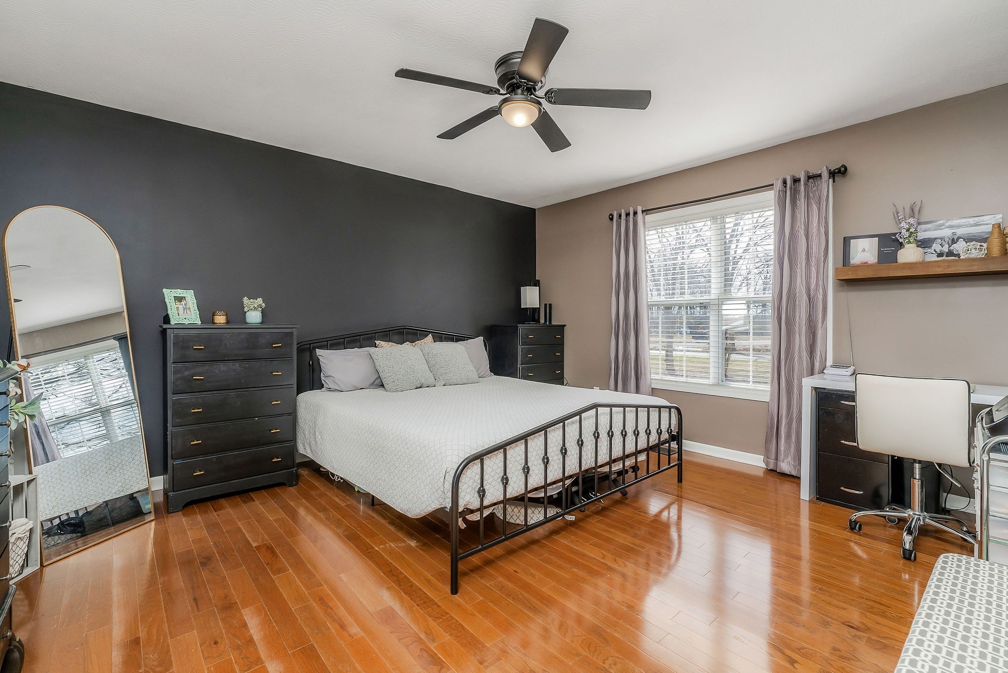 1630 Blackburn Fork Road Cookeville, TN 38501 - Photo 9 of 30 a bed room with a bed and a chair