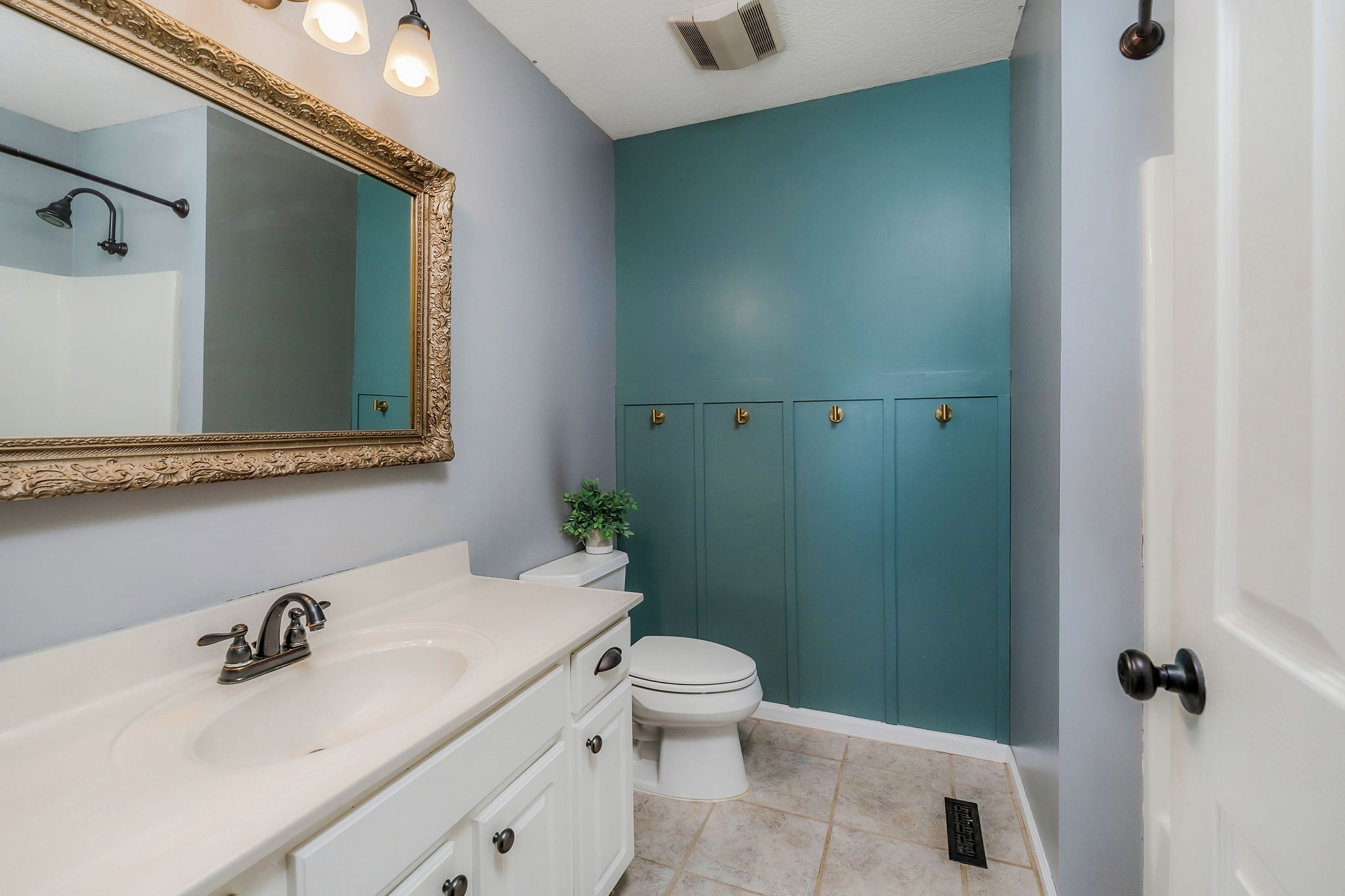 1630 Blackburn Fork Road Cookeville, TN 38501 - Photo 10 of 30 a bathroom with a sink toilet and vanity