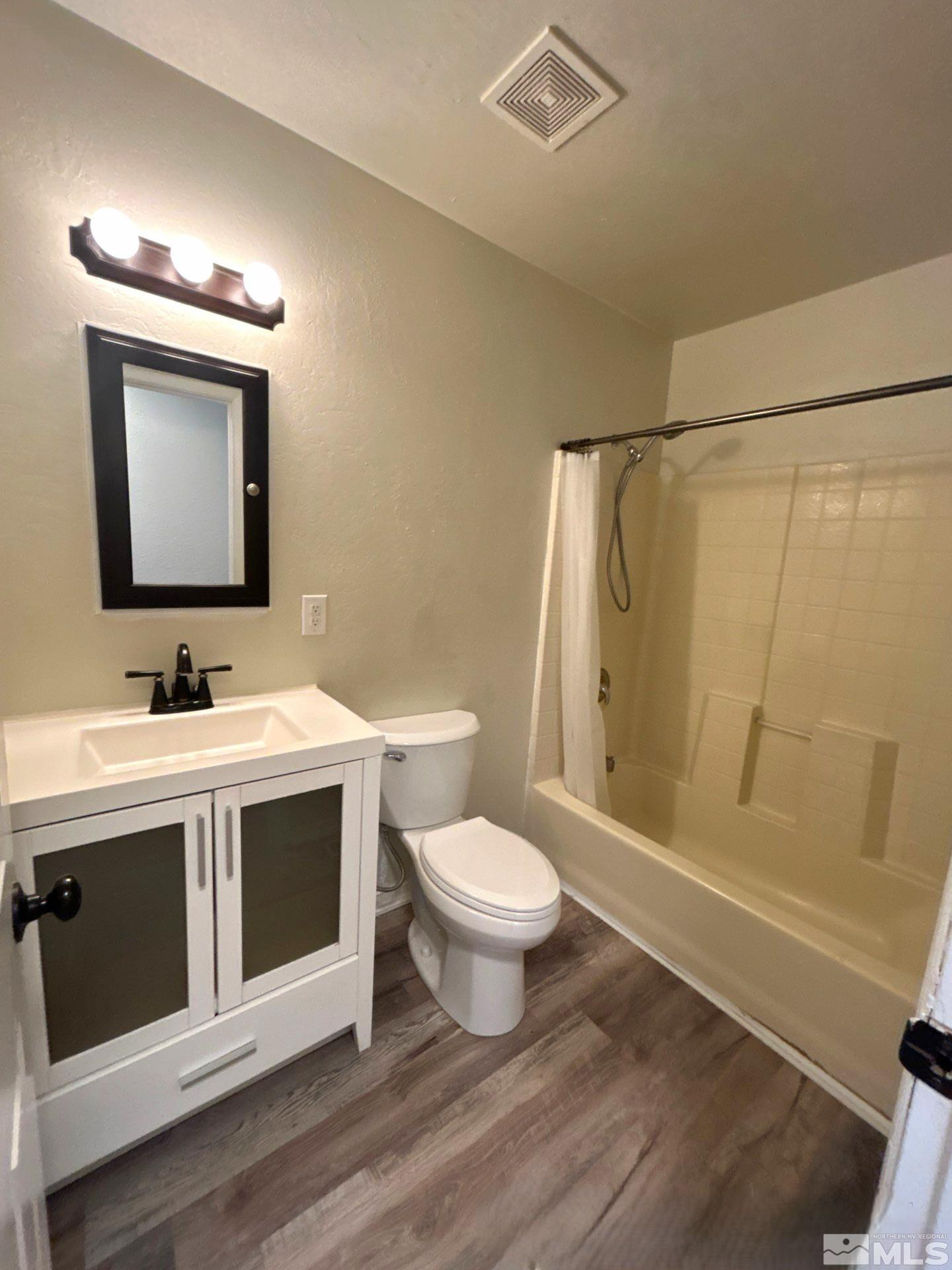 25 Comstock Drive Fernley, NV 89408 - Photo 4 of 10 a bathroom with a sink and mirror