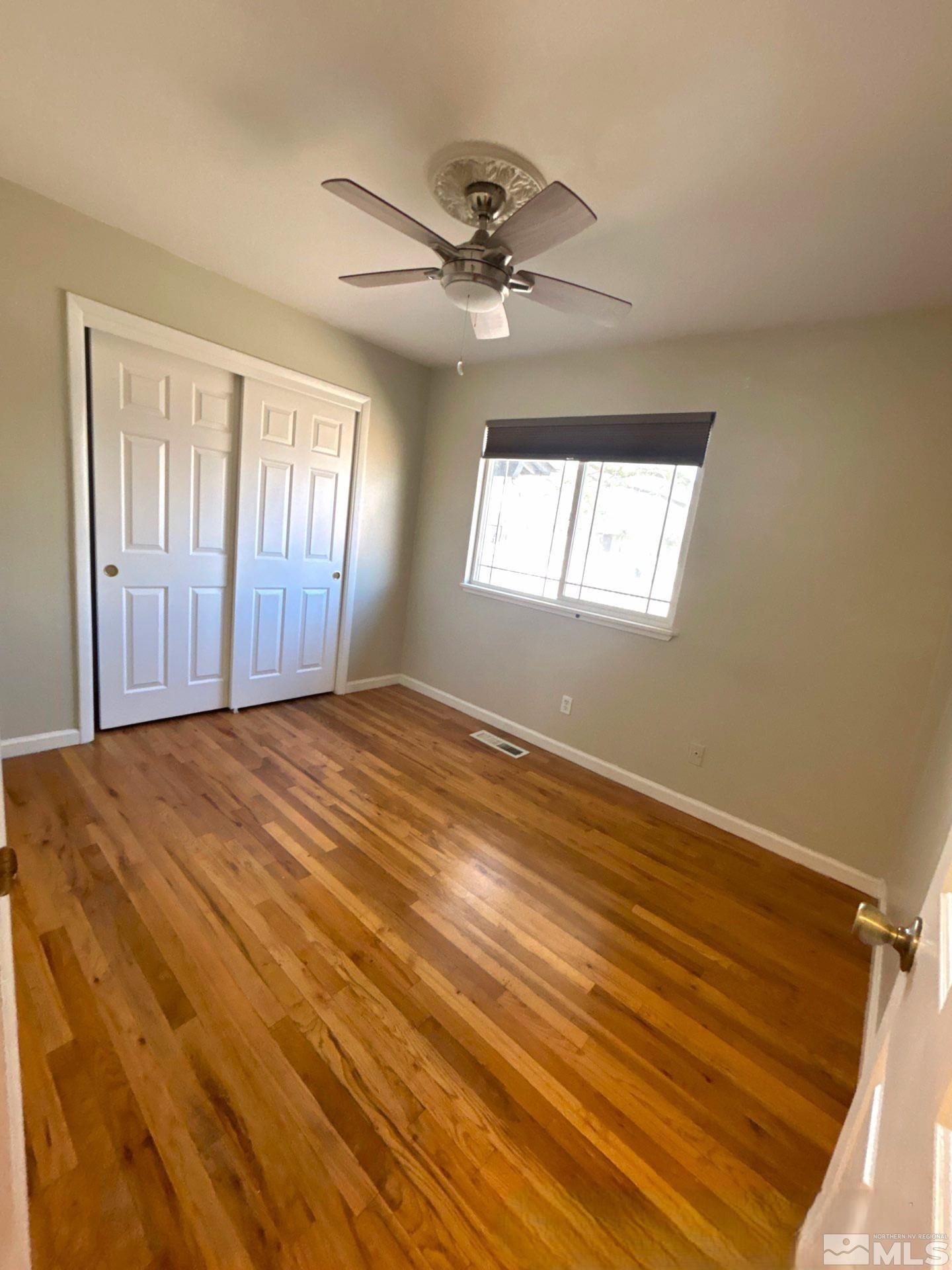 25 Comstock Drive Fernley, NV 89408 - Photo 8 of 10 a view of an empty room with a window