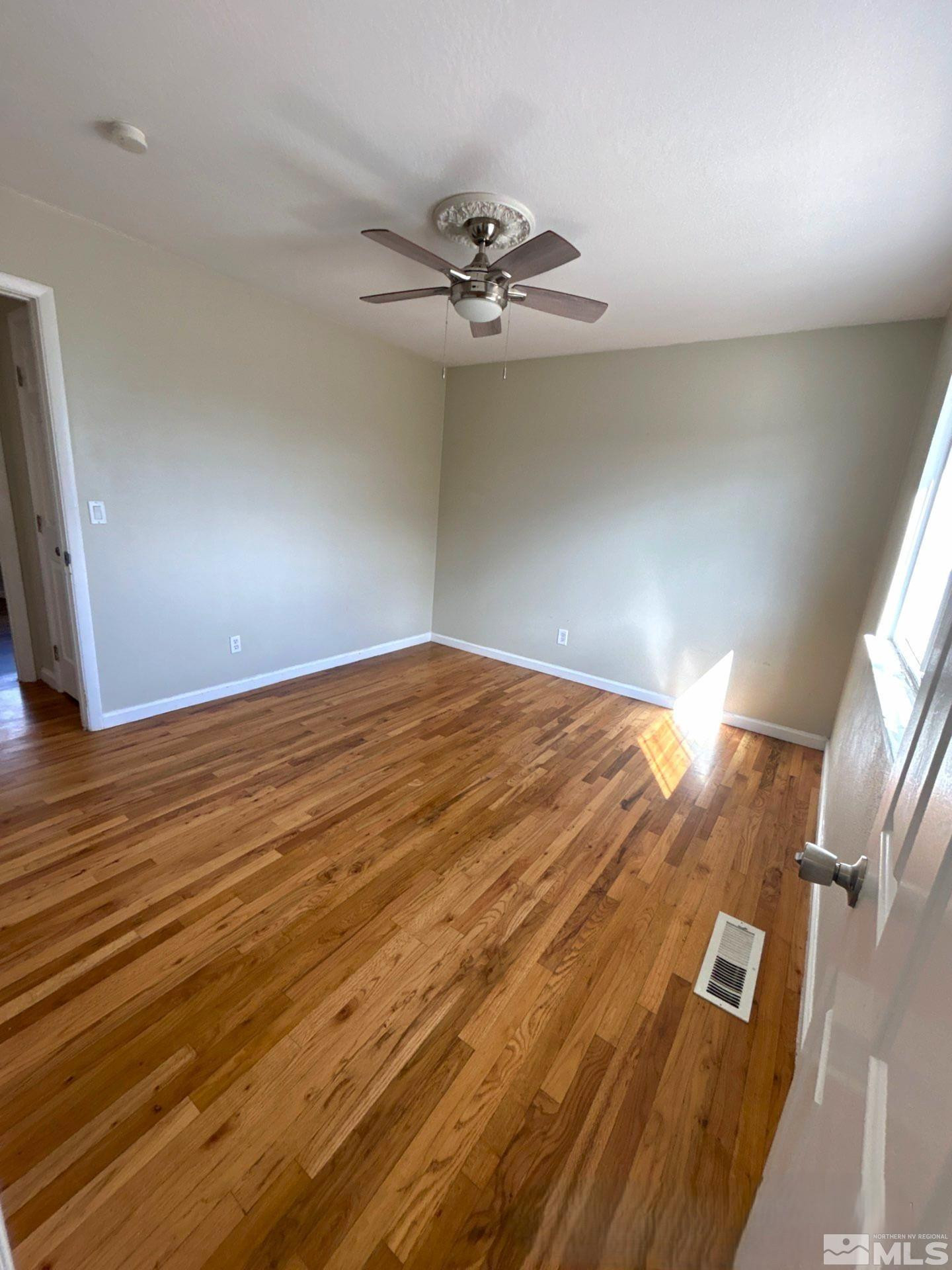 25 Comstock Drive Fernley, NV 89408 - Photo 9 of 10 a view of empty room with window
