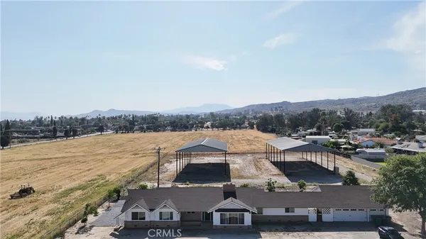 an aerial view of a house with a outdoor space