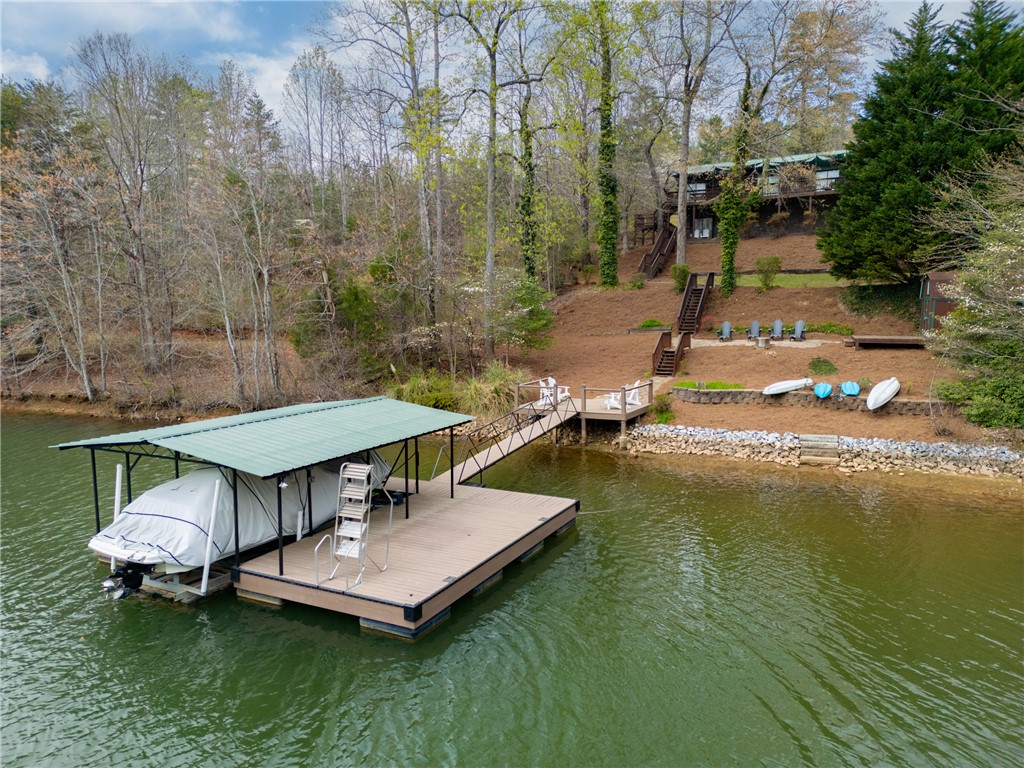 203 Little Lane Seneca, SC 29672 - Photo 44 of 48 This serene waterfront property offers direct lake access and a private boat dock.