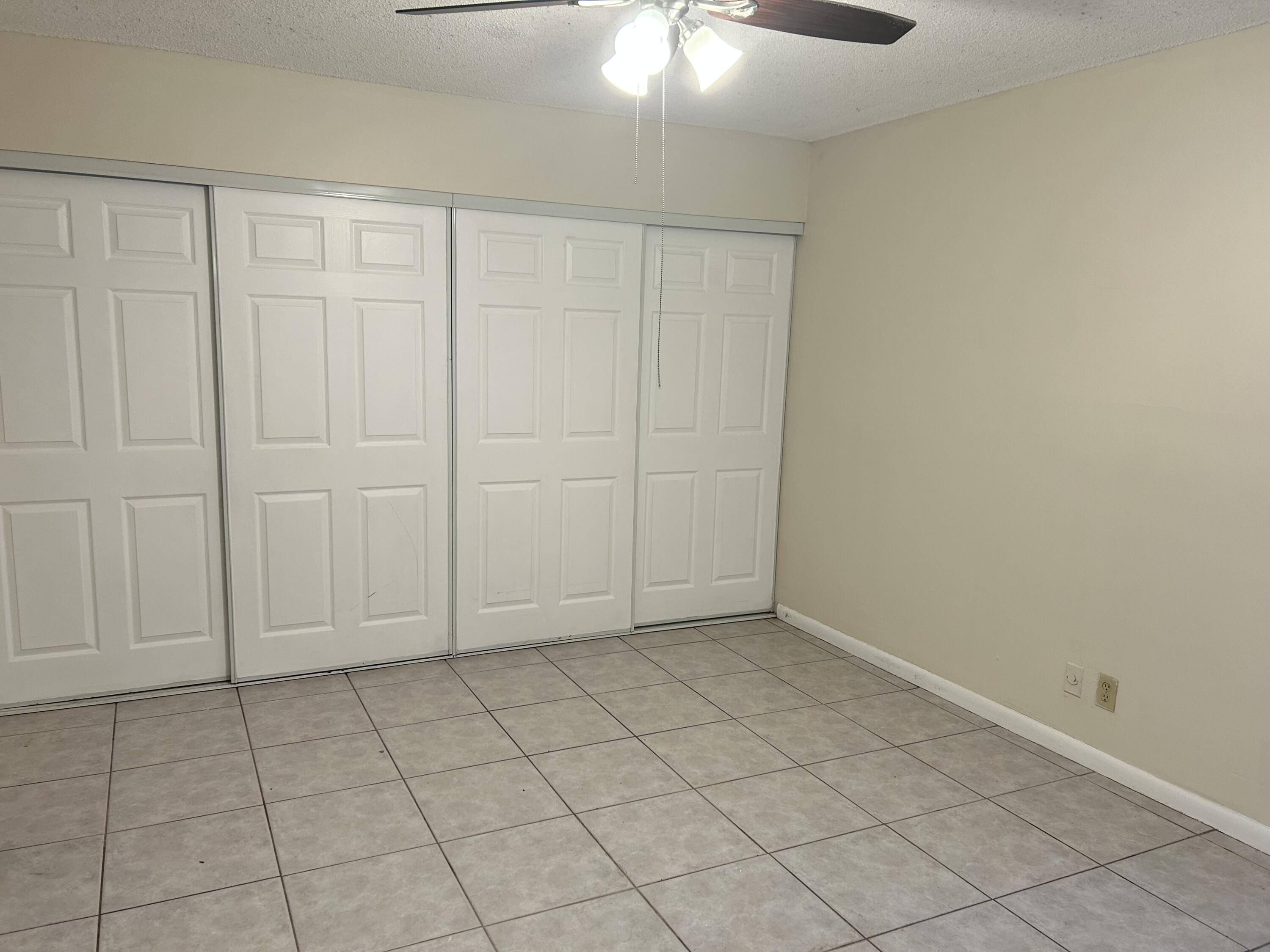 23 Crossings Circle, Unit E Boynton Beach, FL 33435 - Photo 14 of 19 a view of an empty room