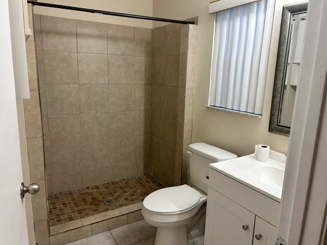 a bathroom with a sink and a toilet