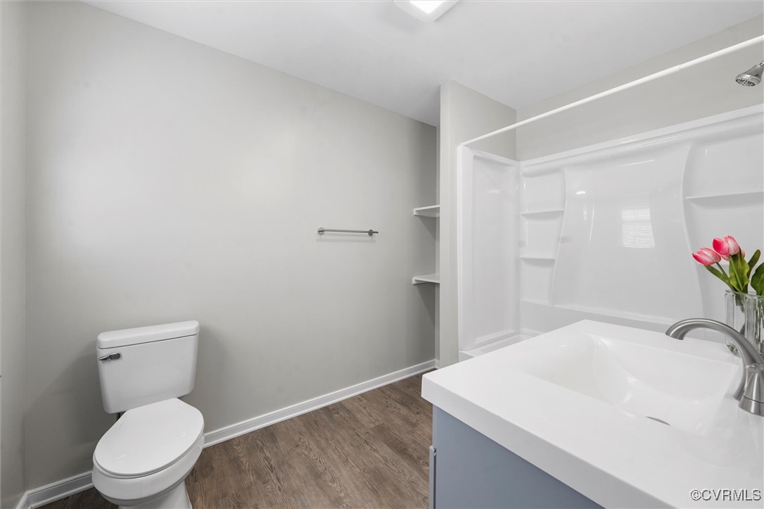 3425 Newbys Bridge Road Chesterfield, VA 23832 - Photo 19 of 49 Bathroom featuring baseboards, wood finished floor
