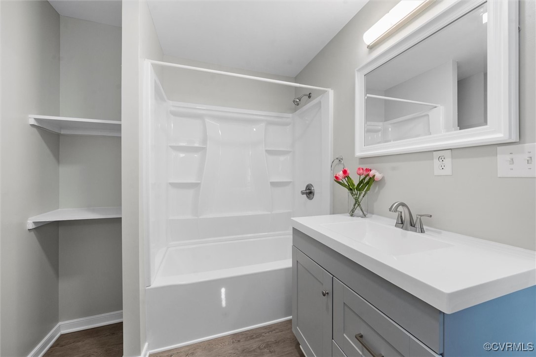 3425 Newbys Bridge Road Chesterfield, VA 23832 - Photo 20 of 49 Bathroom with wood finished floors, shower combin