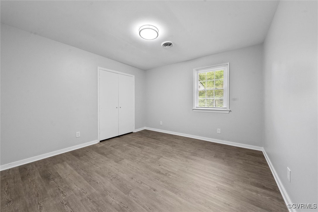 3425 Newbys Bridge Road Chesterfield, VA 23832 - Photo 21 of 49 Empty room featuring wood finished floors, visible