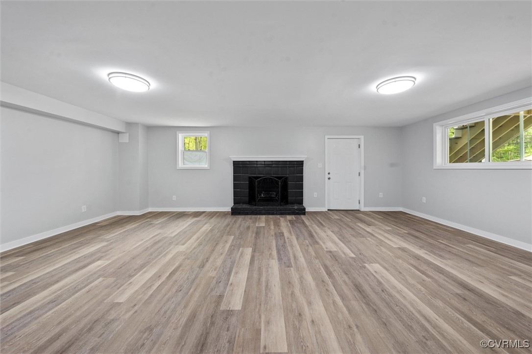 3425 Newbys Bridge Road Chesterfield, VA 23832 - Photo 24 of 49 Unfurnished living room featuring a brick fireplac