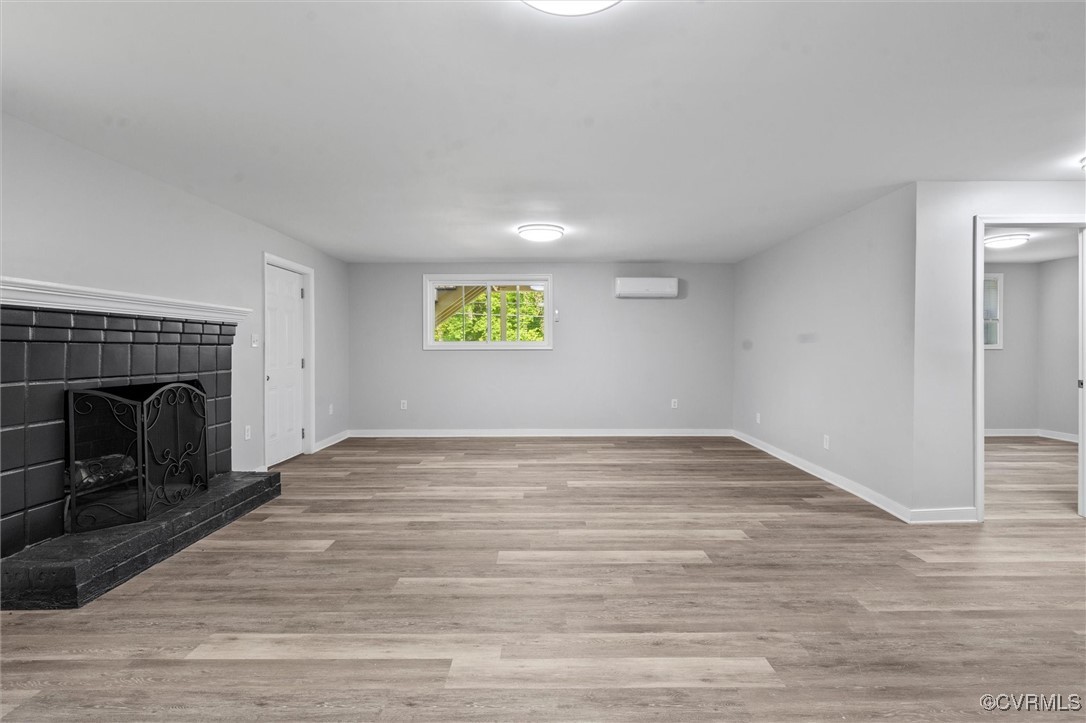 3425 Newbys Bridge Road Chesterfield, VA 23832 - Photo 25 of 49 Unfurnished living room featuring a wall mounted a