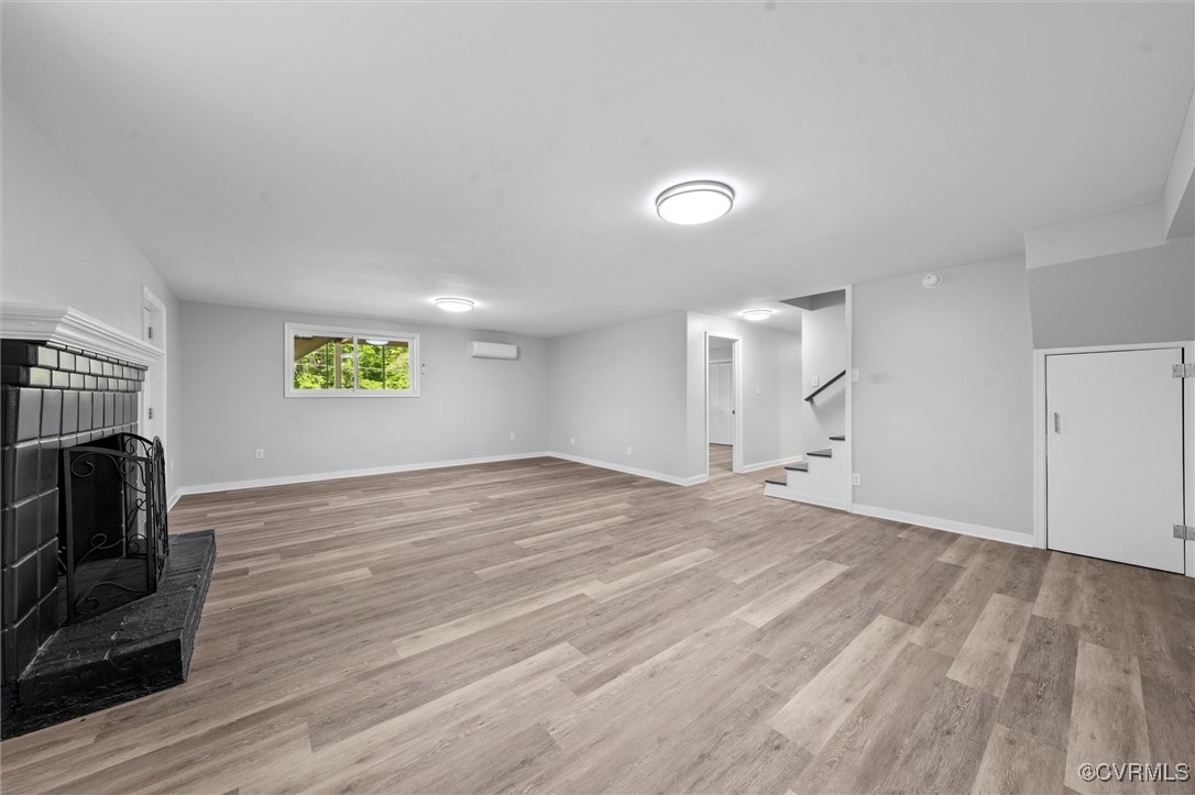 3425 Newbys Bridge Road Chesterfield, VA 23832 - Photo 26 of 49 Unfurnished living room featuring stairs, light wo