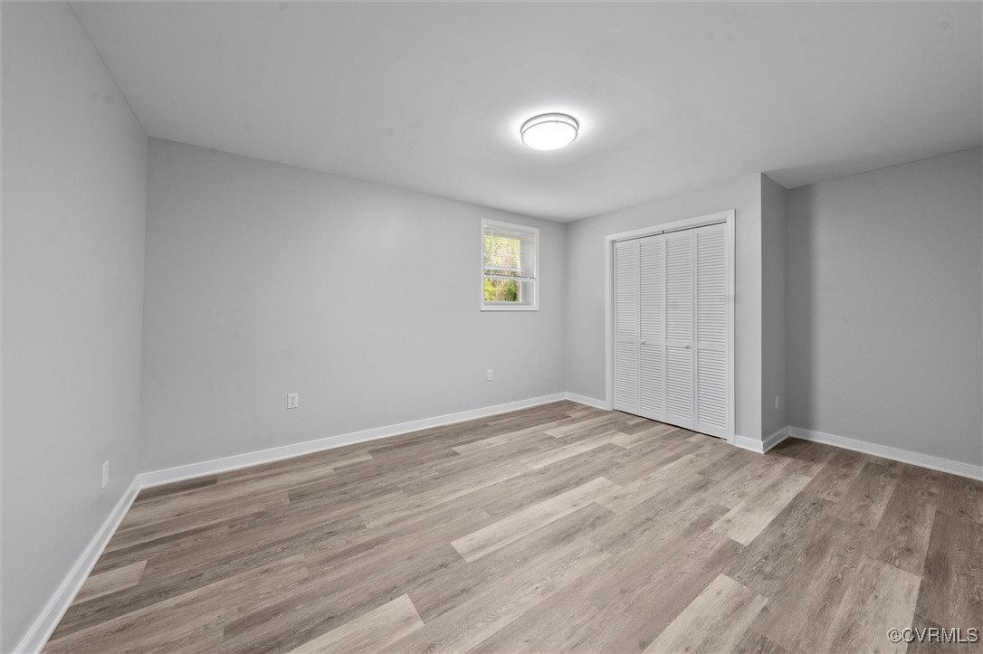3425 Newbys Bridge Road Chesterfield, VA 23832 - Photo 33 of 49 Unfurnished bedroom featuring light wood-type floo