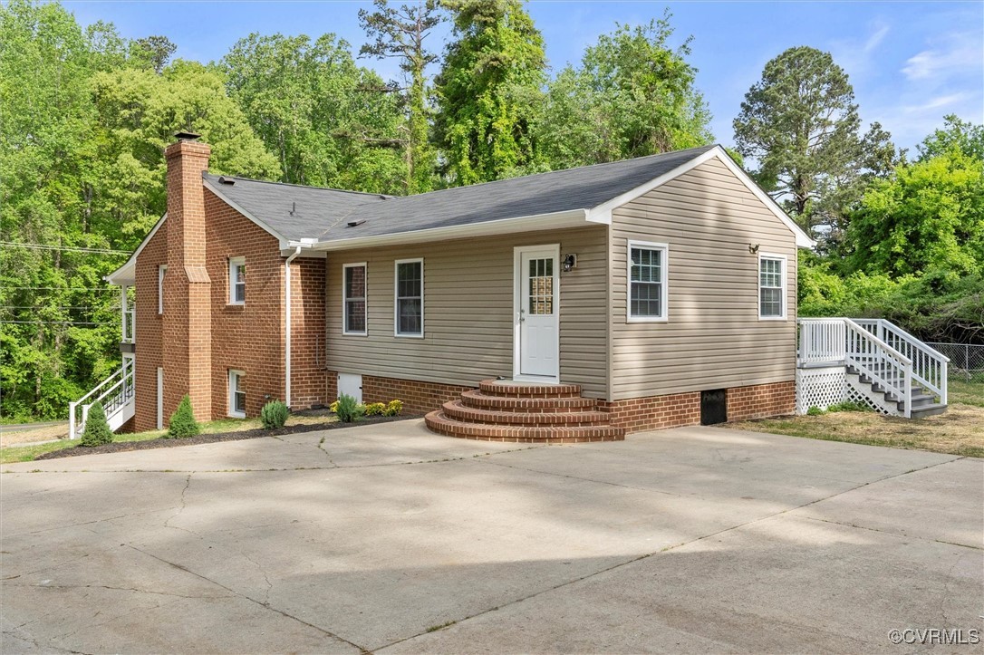 3425 Newbys Bridge Road Chesterfield, VA 23832 - Photo 35 of 49 Rear view of house with driveway, a shingled roof,
