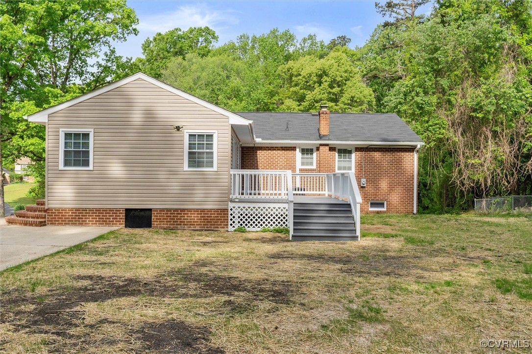 3425 Newbys Bridge Road Chesterfield, VA 23832 - Photo 36 of 49 Back of property with a deck, a chimney, brick sid