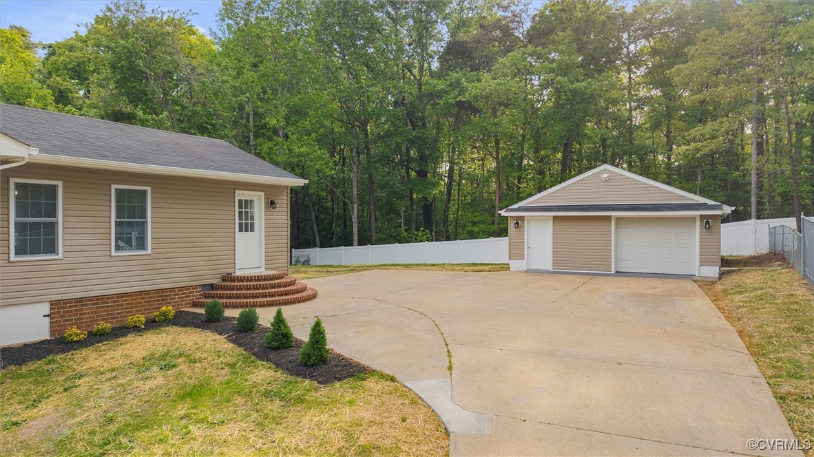 3425 Newbys Bridge Road Chesterfield, VA 23832 - Photo 42 of 49 View of yard featuring an outbuilding, a detached