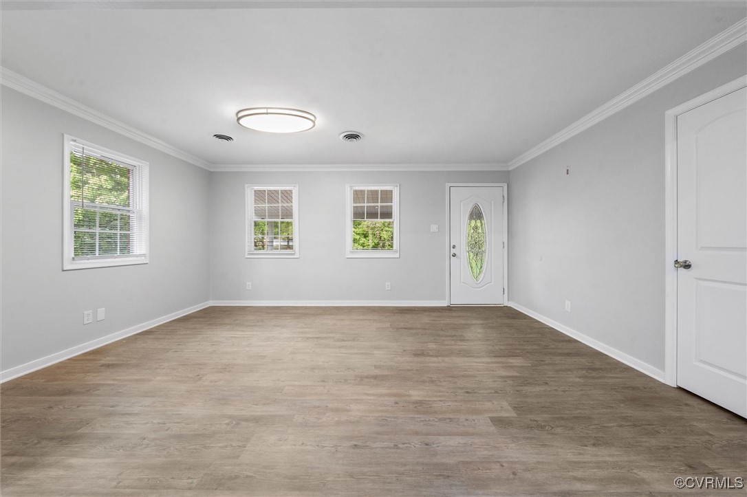 3425 Newbys Bridge Road Chesterfield, VA 23832 - Photo 8 of 49 Spare room with crown molding and plenty of natura