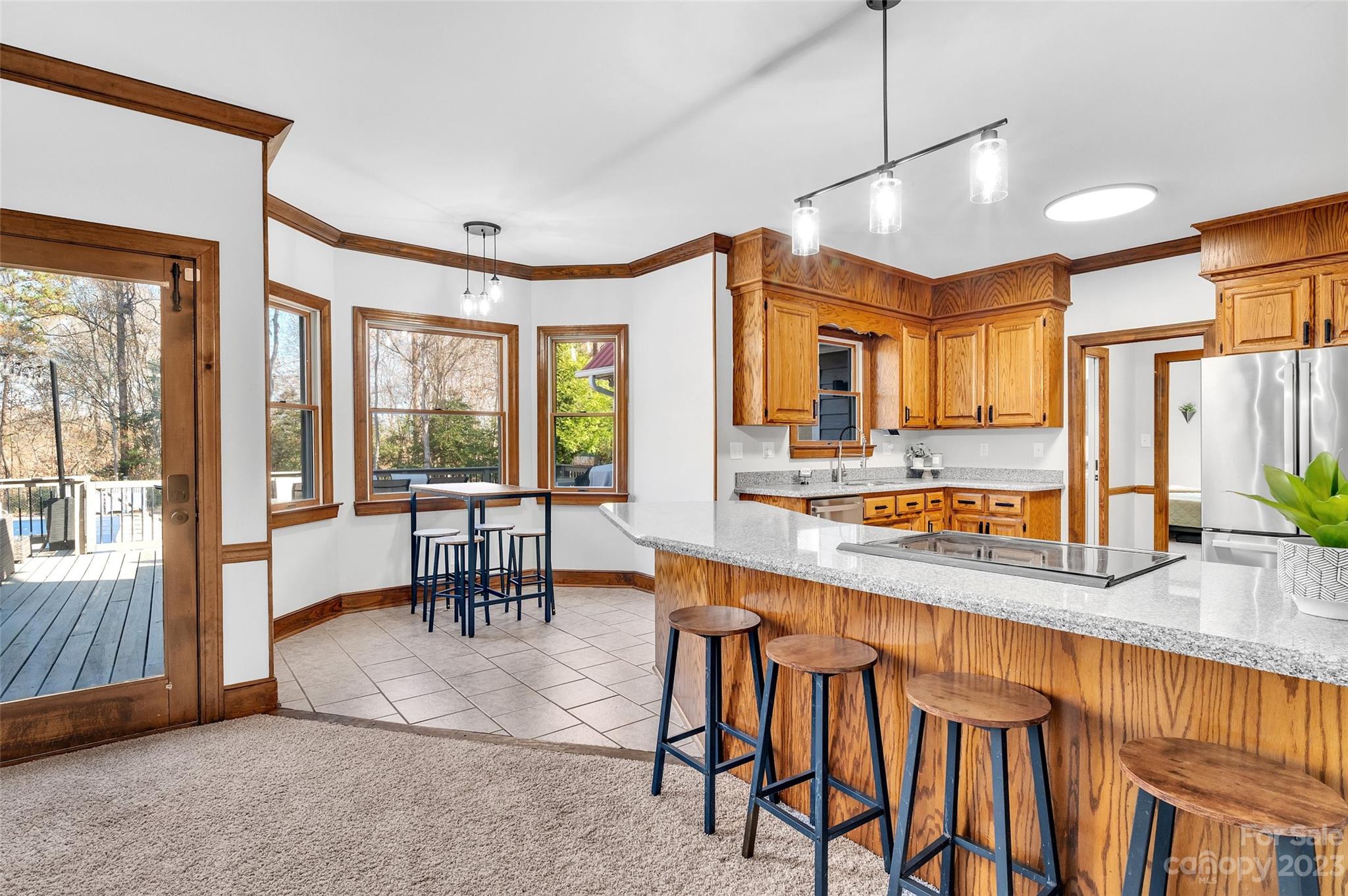 700 West Zion Church Road Shelby, NC 28150 - Photo 13 of 45 a large kitchen with a table and chairs
